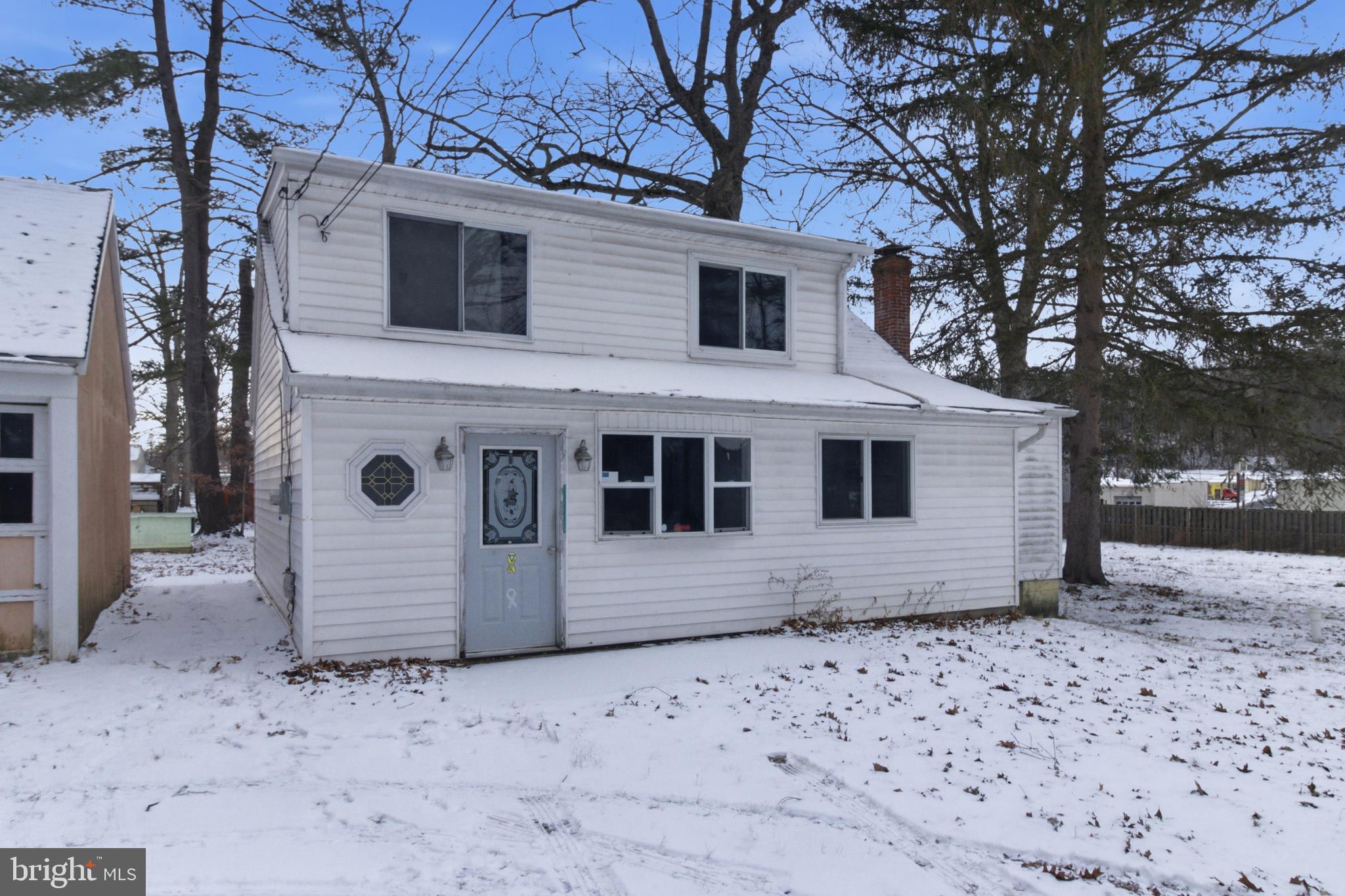 This home is commercial and residential zoning! Welcome to 656 S Temple Lane. Conveniently located near shopping, food, and gas stations.  Home has plenty of natural light, especially the upstairs corridors. This home is located in the Greenwood section of Altoona. It is on approx. .7 acres. Plenty of space in the yard. Home features 2 bedrooms and 1 full bathroom. Laundry is in the partial basement. Home has a main bedroom on the first floor with the 2nd floor, being the second bedroom. Home has a roomy galley style kitchen. Whether you are downsizing, looking for your next investment, or buying your first or next home; this Cape-Cod style home is a must see.