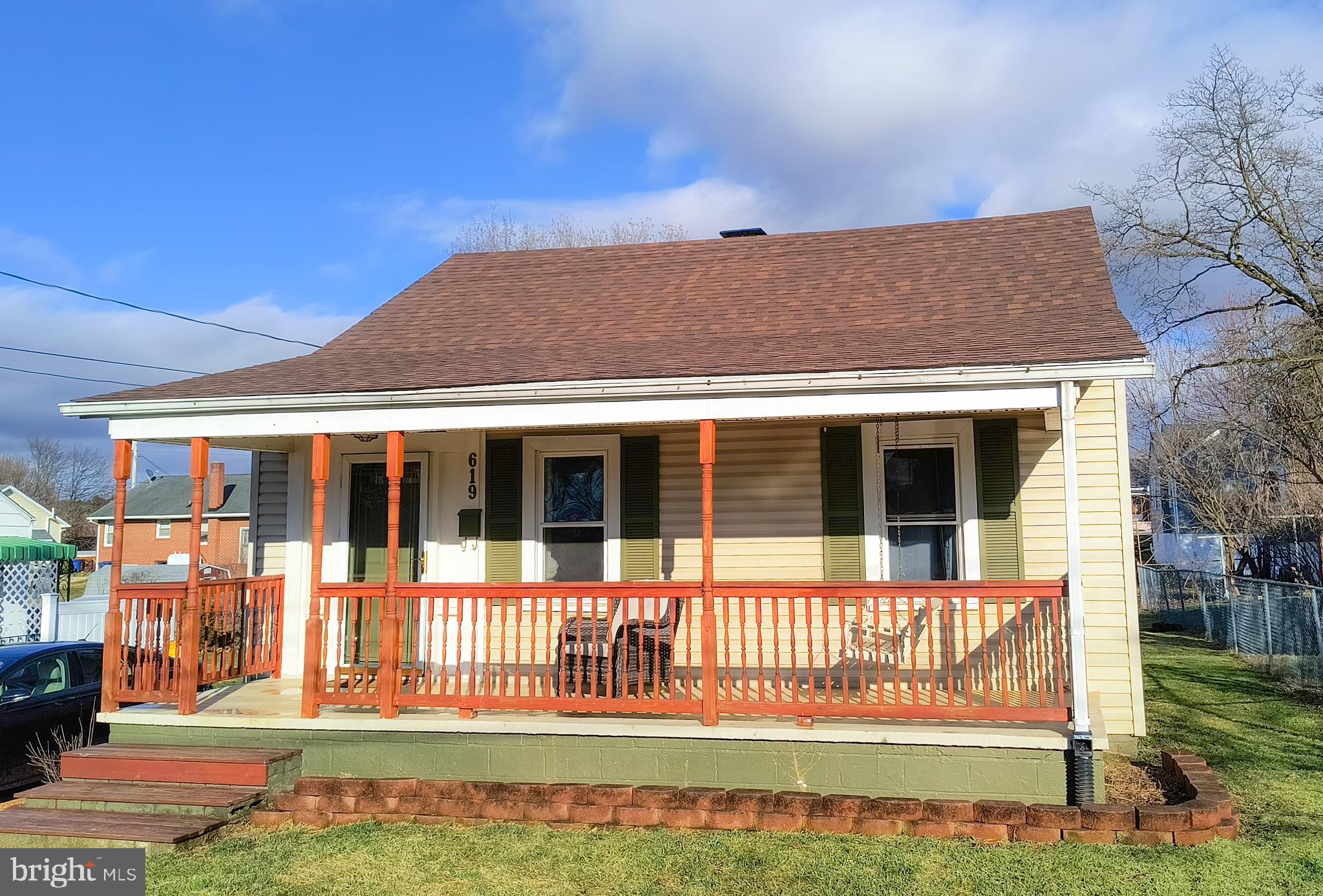 This charming 2 bedroom, 1 bath home has so much to offer. Located in town, close to all the amenities.  Solid hardwood floors throughout the living room and bedrooms. Spacious front porch and rear deck for enjoying the fresh air.  Main level washer and dryer for your convenience. New in 2020: Vinyl plank flooring in kitchen and dining room; New roof; New plumbing; New Electric panel; New heat pump with propane backup!  Bathroom recently renovated in 2019.  The basement has some storage and the potential for a small workshop.