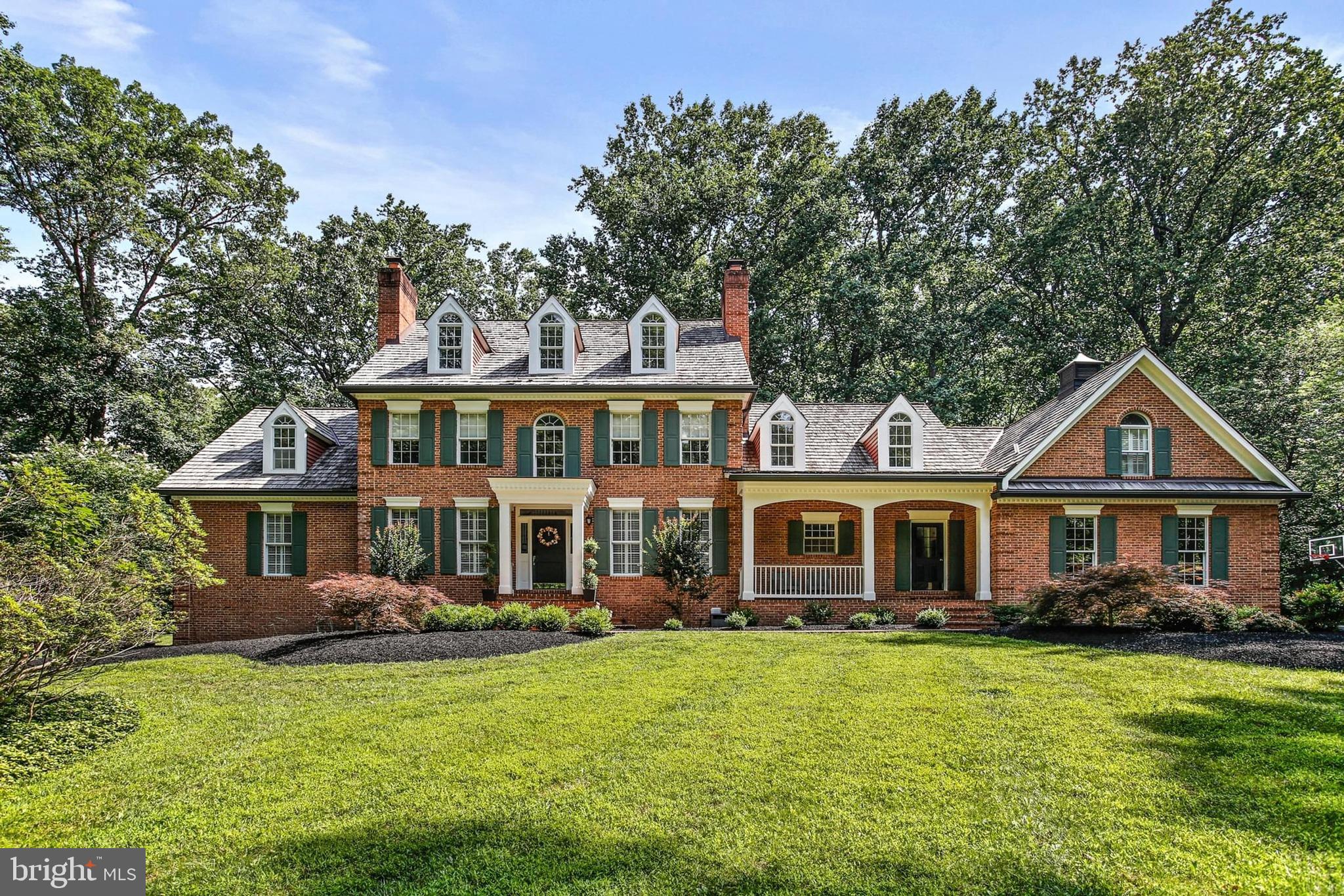 Welcome to this stunning 6-bedroom, 4.5-bath custom home nestled on a private 3.3-acre lot in Ellicott City. Thoughtfully renovated and impeccably maintained, this residence seamlessly blends modern luxury with timeless shabby chic charm. The heart of the home is the show-stopping kitchen that is completely reimagined with custom cabinetry, designer finishes, and top-of-the-line Wolf and Sub-Zero appliances. Ideal for both everyday living and entertaining, this space is as functional as it is beautiful. Spread across four finished levels, the home offers a flexible layout that includes spacious living and dining areas, a charming front porch, and generous bedroom suites. The primary bedroom features two walk-in closets and a private en-suite.  While the additional bedrooms provide ample space for family, guests, or home offices. Outdoor living is a dream with a back deck, brick patio, and a private in-ground pool, all surrounded by serene, professionally landscaped grounds. A three-car garage adds convenience and extra storage. This one-of-a-kind property offers peace, privacy, and style all just a short drive from major commuter routes and local amenities. Don't miss your opportunity to own this exceptional home.
