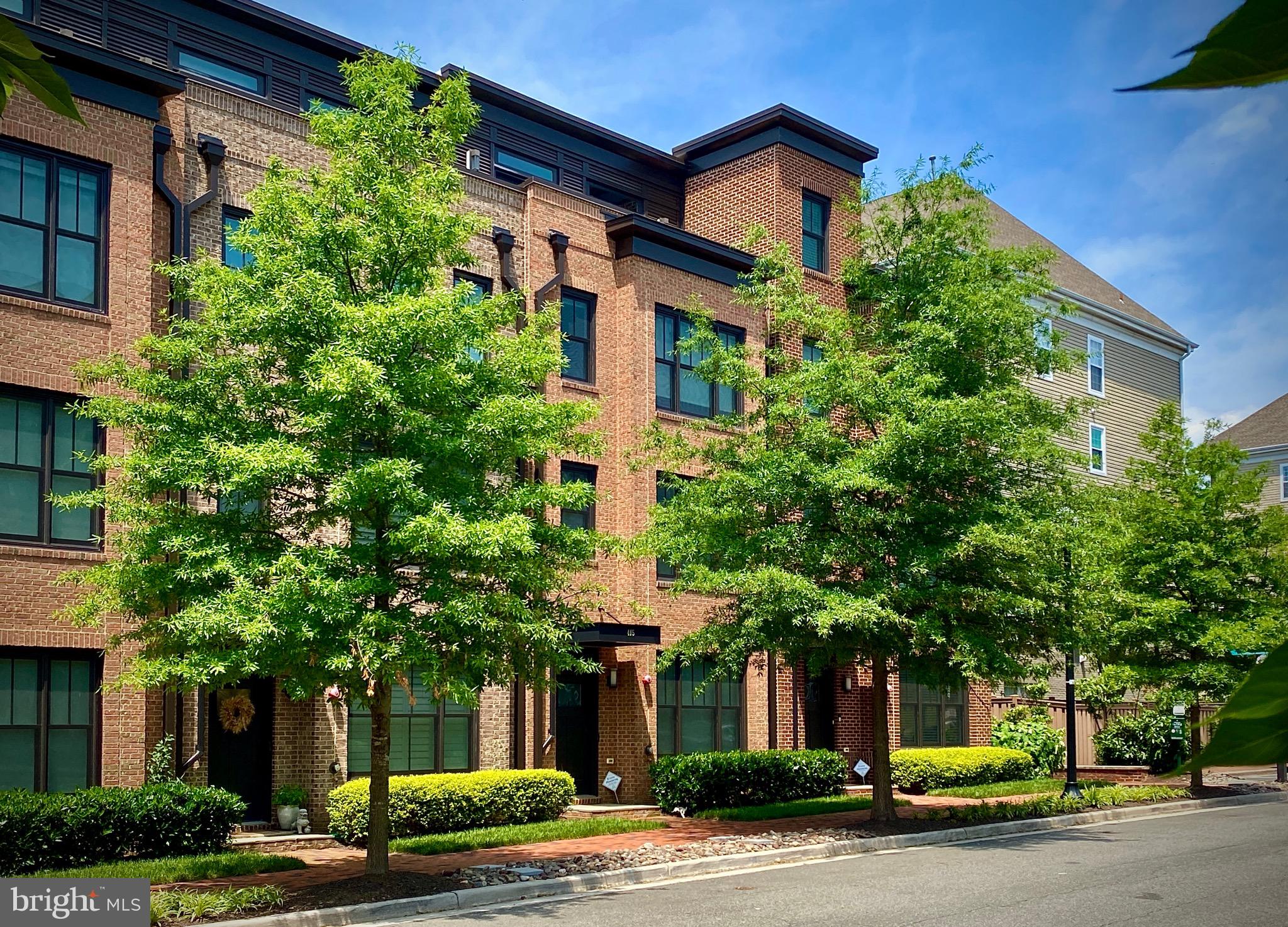 Take advantage of the lower interest rates! This elegant Townhome is nestled in the  Heart of Old Town Alexandria. Constructed in 2016, this residence is perfect for entertaining. The gourmet Kitchen boasts GE Monogram Stainless Steel Energy Star appliances, soft-close cabinetry, and a timeless 10' Carrara marble waterfall Island with ample storage and seating for 6. This home showcases an airy, expansive floor plan accentuated by rich, dark hardwood floors throughout, sophisticated modern finishes, and soaring 9 ft+ ceilings. The sun-drenched 4th-floor family/guest bedroom is a crown jewel, featuring front and rear outdoor terraces, a full bathroom with a glass shower, and a fully equipped wet bar with marble countertops and a wine fridge. The classic brick of the entire front is timeless and elegant, while the rear boasts a true two-car garage and durable Hardi plank siding. This beautiful property is Energy Star certified, with two heating and cooling systems. Just a few blocks from restaurants, shops, and the Metro/Amtrak station. 

*Photos with furniture have been virtually staged.