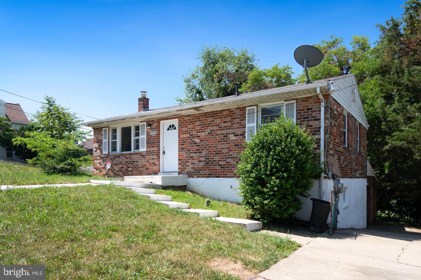 Brick rancher on a corner lot with a fully finished basement, a combination you won't find often in this part of College Park. Four bedrooms and two full baths above grade, plus a finished lower level that adds real square footage and flexibility for the next owner.

The basement includes a full bathroom and an additional room currently set up as a fifth bedroom. It works equally well as a guest suite, in-law space, home office, or recreation area. Whether you need room for extended family, a roommate situation, or simply more living space than a typical rancher offers, this home delivers it.

Recent improvements include a new roof with solar panels, providing meaningful savings on monthly energy costs along with long-term durability. The classic brick exterior keeps maintenance low and gives the home strong curb appeal.

The corner lot is a real asset here. You get more yard, more natural light, and a wider footprint than interior lots in the neighborhood. Off-street parking plus a driveway that fits up to five vehicles is another standout in an area where parking is often tight.

Convenient to Route 1, the Beltway, the University of Maryland, and the College Park Metro, with shopping, dining, and parks all close by. Move in ready and priced to sell.