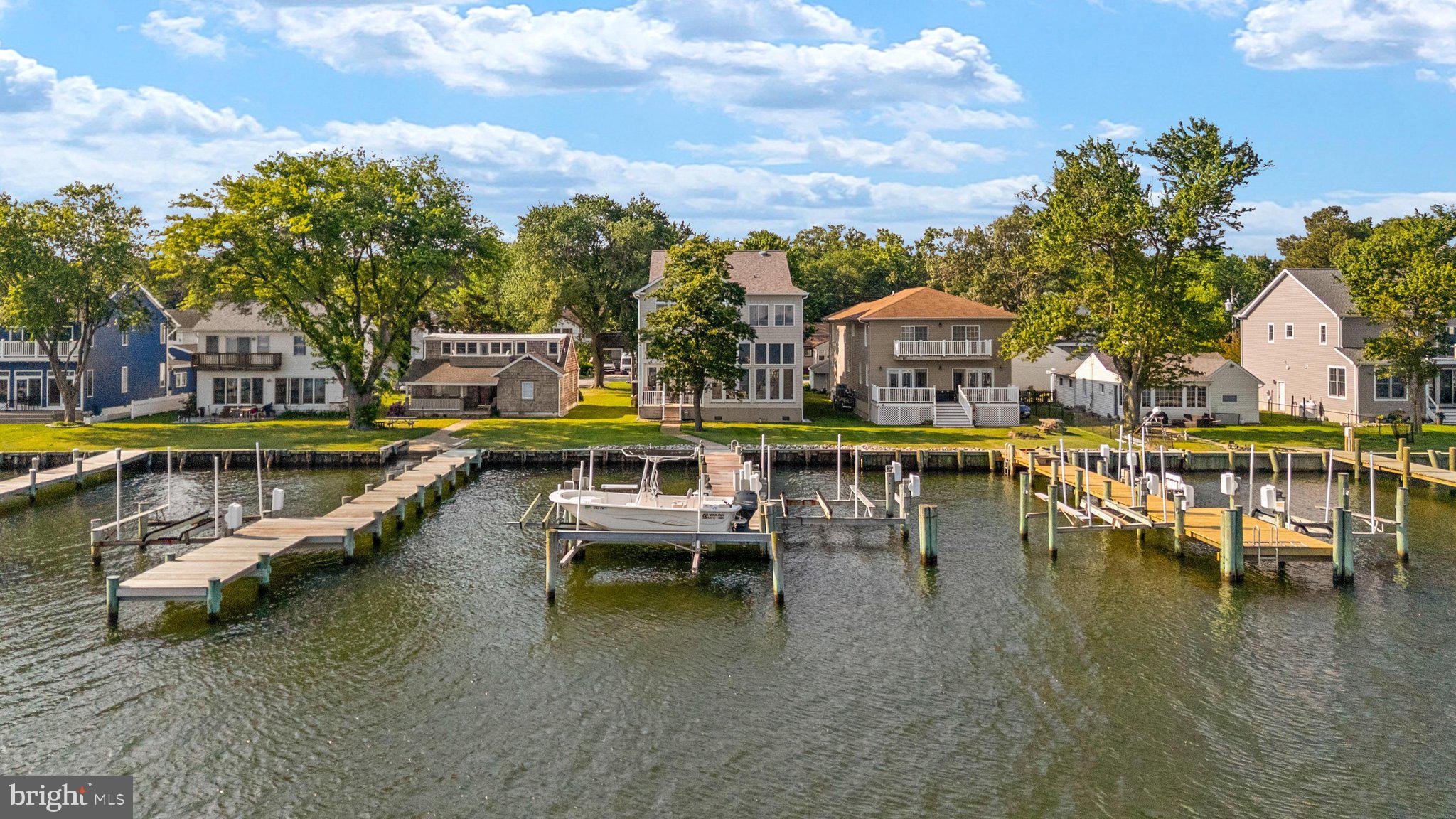 Experience the best of Waterfront living at 952 Chester Beach Road, where panoramic water views, spectacular sunsets, and thoughtful custom design come together to create an exceptional waterfront retreat.

Offering over 3,500 square feet of living space, this custom-built home is perfectly positioned to capture endless water views from nearly every room. High ceilings and expansive windows fill the home with natural light while framing the ever-changing waterfront backdrop.

Designed for both everyday living and effortless entertaining, the main level features an open floor plan that seamlessly connects the living, dining, and kitchen spaces. The gourmet kitchen is equipped with gas cooking, abundant cabinetry, and generous workspace, allowing you to prepare meals while enjoying stunning views of the water.

With five bedrooms and two-and-a-half baths, there is plenty of room for family and guests. Thoughtful design elements throughout the home maximize both functionality and comfort while keeping the focus on the incredible waterfront setting.

Step outside and discover a boater's dream. The private pier is equipped with electric, water, three boat lifts, including a 20,000-pound lift, 10,000-pound lift, and 2,500-pound lift, offering exceptional flexibility for multiple vessels and watercraft. Spend your days on the water and return home to breathtaking sunsets over the Chester.

Additional features include a NEW roof, 2 - 1 year old HVAC systems, tankless hot water heater, attached two-car garage with excellent storage, 50 amp RV hook up, and the quality craftsmanship expected in a custom-built waterfront residence.

Whether you're searching for a year-round residence or the ultimate waterfront getaway, 952 Chester Beach Road offers a rare opportunity to enjoy unmatched views, premier boating access, and the relaxed lifestyle that makes Maryland's Eastern Shore so special.