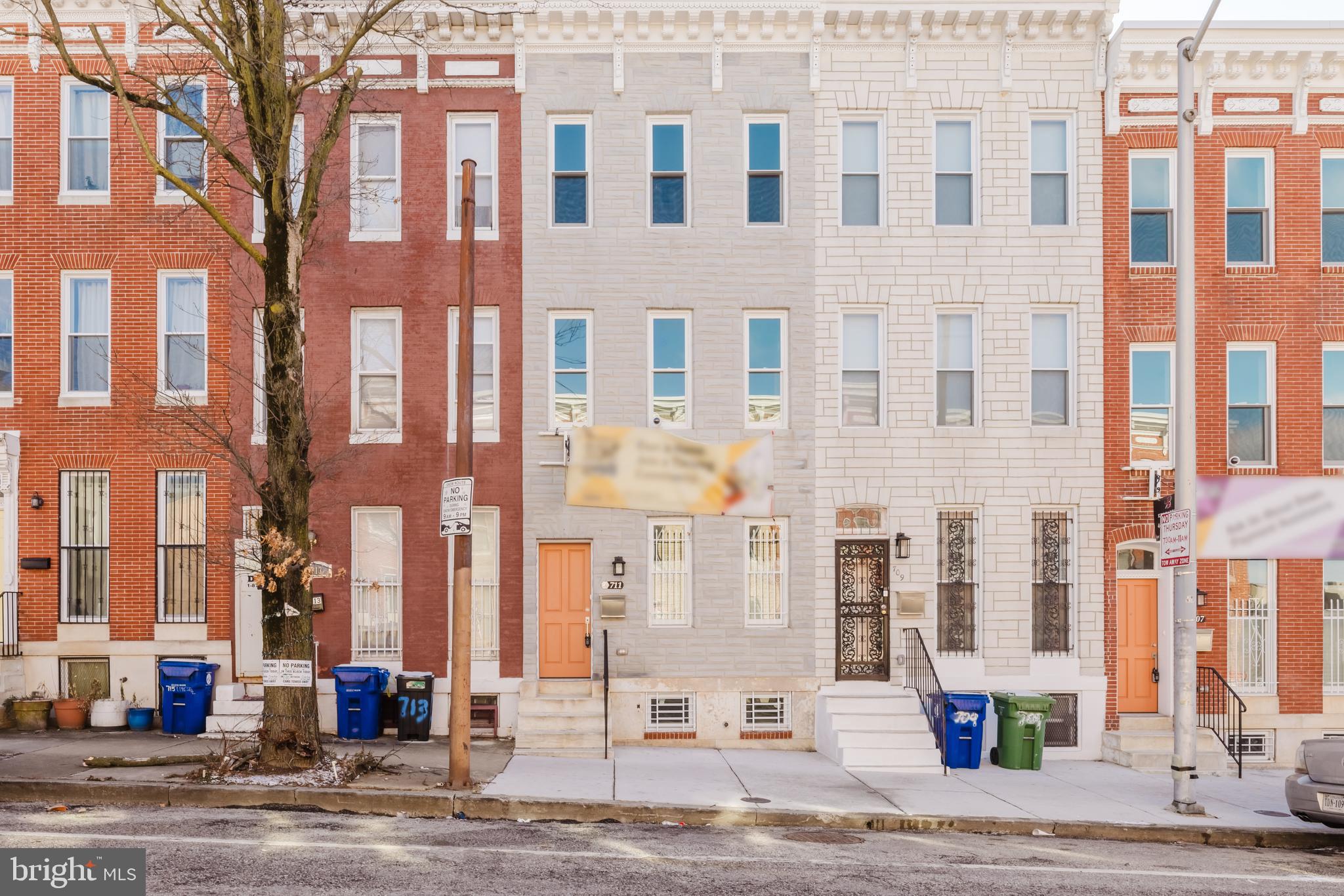 **** 5K Seller Incentive and free washer & dryer for full price offer by May 31st**** PLUS - HUGE CHAP tax credit (greatly reduces your taxes for 10 years.) PLUS - Eligible for 10K V2V grant towards down payment (as long as V2V has money in their program) and buy back the block (give up to 20K to eligible buyers). These and other grant programs may be stacked. **Charming & Completely Rebuilt 3-Bedroom 2.5 BA Baltimore Townhome!**  Newly Rebuilt Home meaning other than the foundation, the marble stoop and some brick, we have newly constructed  everything; New Water lines, New sewer lines, New Framing, New walls, New Floors, New windows, New Roof, New Electric, New Plumbing, New HVAC, New Water Heater, systems and more.  Step into this beautifully rebuilt 3-bedroom, 2.5-bath home featuring an open floor plan and high ceilings, tall windows and recessed lighting  throughout. The spacious living room boasts floor-to-ceiling windows, filling the space with natural light. HARDWOOD FLOORING flows seamlessly into the eat-in kitchen, which showcases brand-new granite countertops, stainless steel appliances, and a convenient half bath on the main level.  The fully fenced backyard is perfect for entertaining. Upstairs: Upper 1 offers 2 generously sized bedrooms that share a full bath, along with a conveniently located laundry area. Upper 2 is dedicated to the stunning primary suite, complete with a private full bath and walk-in closet.  Brand-new carpeting extends throughout the upper levels. The lower level includes a conditioned space with extra insulation for added protection and an abundance of storage space.  This stunning home is truly a **must-see**—don’t miss your chance to call it home! LOCATION! LOCATION! LOCATION! Walkability to the inner harbor & Johns Hopkins Hospital, 6 bus stops nearby, metro station 10 minute walk, train station 5 minute walk, light rail 1 mile away, airport 10.6 miles. Be part of Johnston Square's wonderful community near the New Enoch Pratt Library and Greenmount Park!