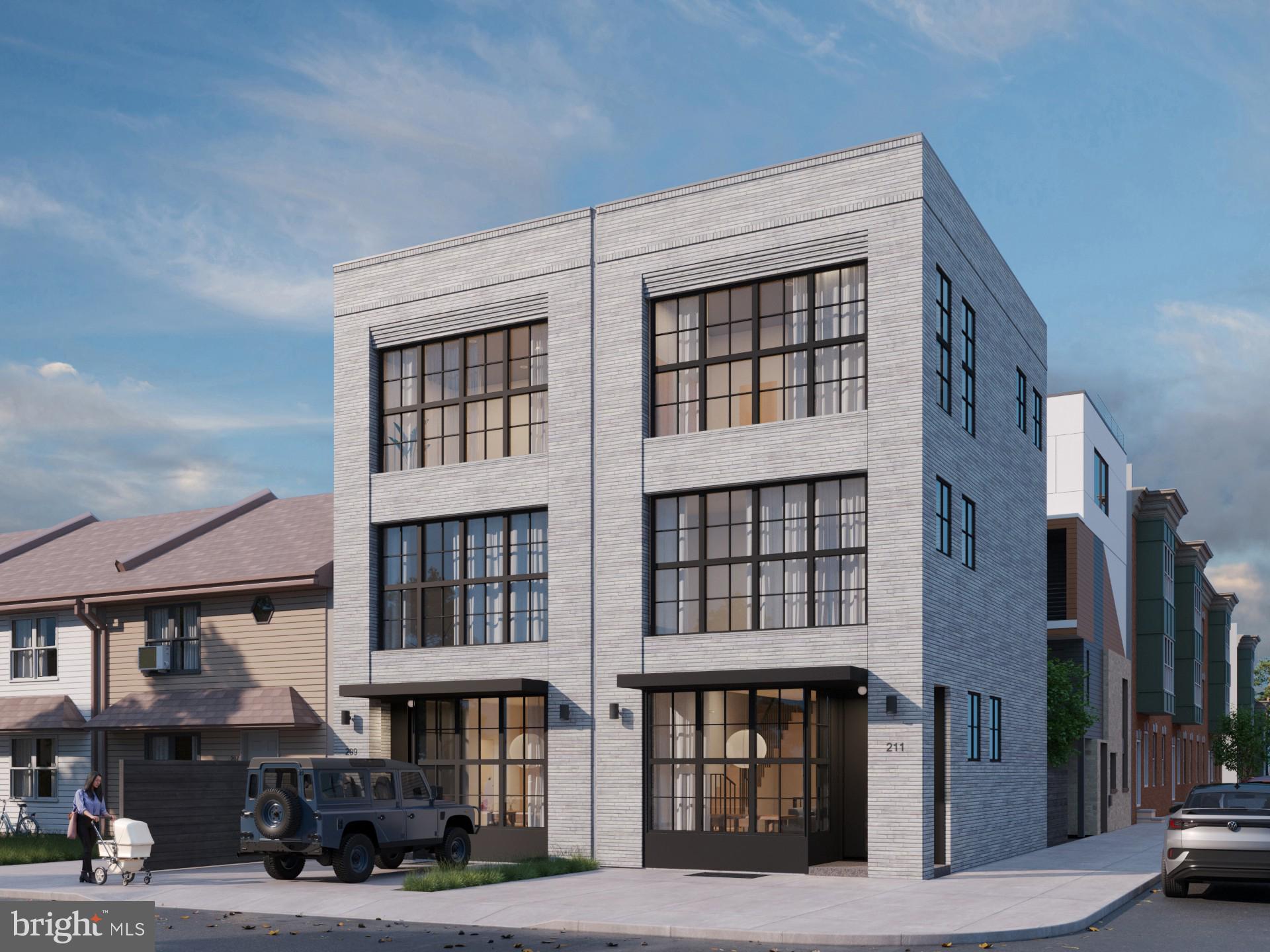 Delivering April 2026.

Introducing 211 E. Wildey St, a 19' wide townhome on the riverside in booming Fishtown. The home blends modern style and contemporary functionality at tremendous value in the heart of Fishtown. Whether you're drawn to the corbeling brick facade, the 2-car off-street parking, or a private outdoor oasis, every detail at 211 E Wildey St has been meticulously curated by a team of well-respected architects, builders and developers. Inspired by Fishtown's industrial past, the home employs large loft-like windows deeply recessed to create shadows across the facade and reveal several planes of linear raked brick.

The kitchen features rift oak cabinets with under-cabinet lighting, concrete style countertops and backsplash, Louis Poulsen pendant lights, and a premium appliance package. The primary suite spans the entire second floor and is as luxurious as it is functional-- with a large walk-in closet, a spacious bathroom with a stand-alone tub and shower and floating dual vanities.

Secure your place for a chance to tailor interior finishes to your exact specification and need! Optional upgrades include built-in surround sound system, rooftop porcelain paver pedestal system, panel-ready refrigerator, custom built-ins, radiant heated floors and more! Reach out to the listing agent with questions or for more information.