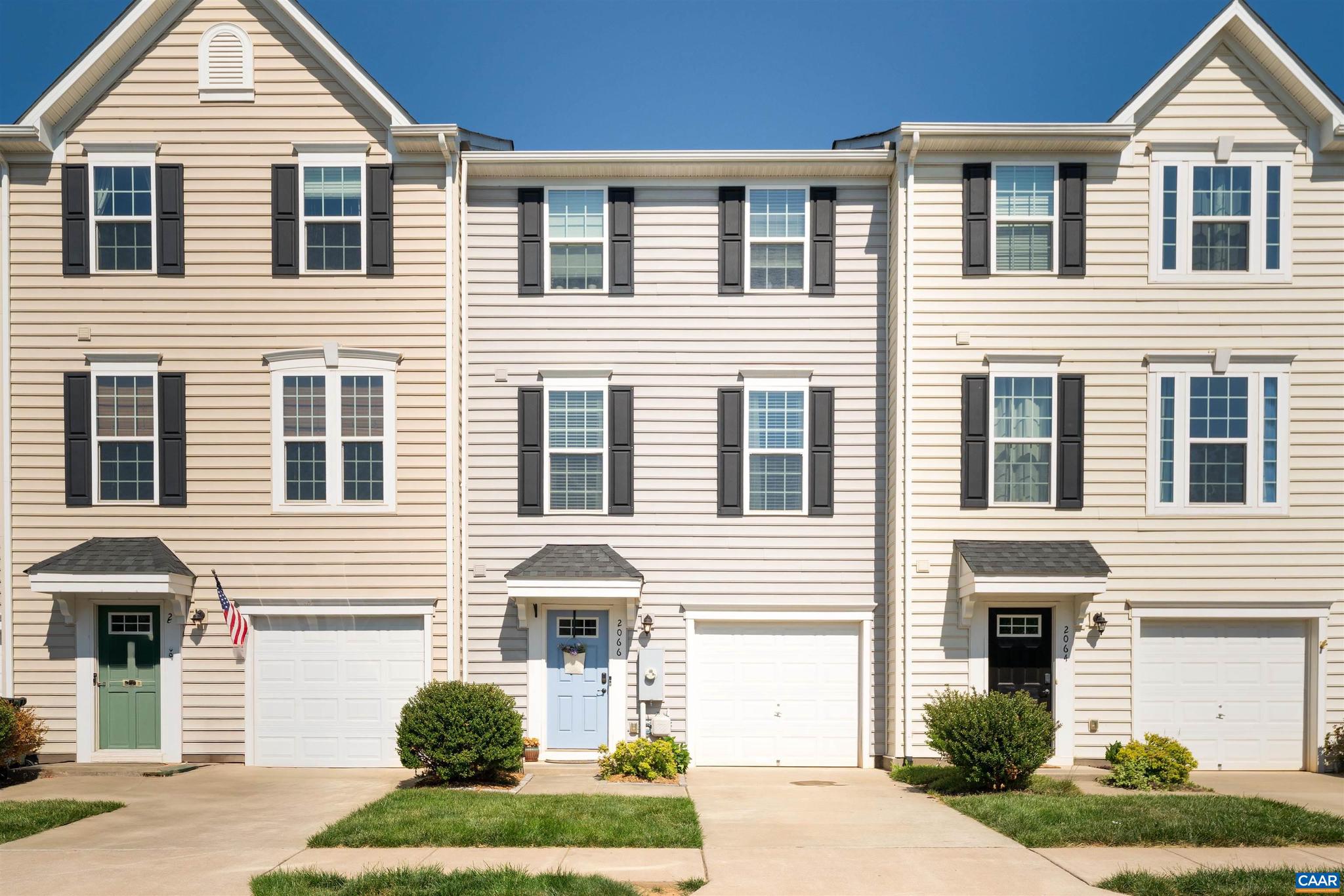 Desirable three story townhouse offering exceptional quality at an exceptional price.  Located just off of 29N across from NGIC and Rivanna Station, this home features three bedrooms, fantastic use of space both inside and out, and quality finishings throughout.   Through the entrance, one can access the garage to the right, half bath to the left, or continue to the large recreational room versatile enough for a home office, gym, or theater room.  Up the stairs one lands onto the bright and open main level.  Drenched with sunlight from the numerous windows, the luxury vinyl plank flooring runs from the spacious living room into the sizable kitchen complete with a huge island, maple cabinets, a gas range, and granite countertops.  Upstairs, the primary suite with tray ceilings and en suite primary bath is positioned opposite of the two additional bedrooms and full bath.  Enjoy warm summer evenings on the back deck in the fully fenced backyard- large enough for those with a green thumb to install raised beds.  Located 10 miles from downtown Charlottesville and 2.5 miles to Hollymead.,Granite Counter,Maple Cabinets