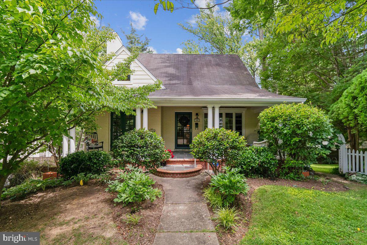 Nestled at the end of a quiet, pristine cul-de-sac in the highly coveted Chevy Chase Manor neighborhood, this elegantly understated Cape Cod effortlessly blends comfortable interior living with spectacular, private outdoor retreats.

Before you even cross the threshold, a spacious, covered flagstone front porch invites you to pause, recline, and admire the surrounding lush greenery that provides a surprisingly secluded front-of-home experience. 

Step inside to find beautiful hardwood floors that connect the open-concept living and dining areas. The charming country kitchen is equipped with ample cabinetry, stainless steel appliances, and plenty of space for a center prep table. Enjoy the ultimate convenience of a main-level bedroom and adjacent full bathroom.

Upstairs, the extended primary bedroom suite serves as a true sanctuary, featuring a dedicated sitting area, stately structural columns, and a cozy desk nook perfect for a quiet home office. The home's third bedroom and a second full bathroom complete the upper level.

The lower level is where recreation and entertainment truly come to life in this home, boasting a generous recreation room centered around a cozy fireplace. This vibrant space opens directly to a stunning rear brick patio, enveloped by mature landscaping and privacy fencing that sets the stage for flawless indoor-outdoor hosting.

The outdoor magic continues on the side of the home, as the brick patio gives way to a gorgeous, gently sloping yard framed by a picturesque garden archway and a classic picket fence, with the soothing flow of Rock Creek just a few steps in the distance.

Perfectly positioned for both tranquility and convenience, this exceptional property is located just a few blocks from Chevy Chase Local Park and the popular shops and restaurants along Brookville Road. It also offers effortless access to the scenic trails of Rock Creek Park, the prestigious fairways of both the Chevy Chase and Columbia Country Clubs, and the world-class dining and shopping of downtown Bethesda, making it the perfect place to call home.