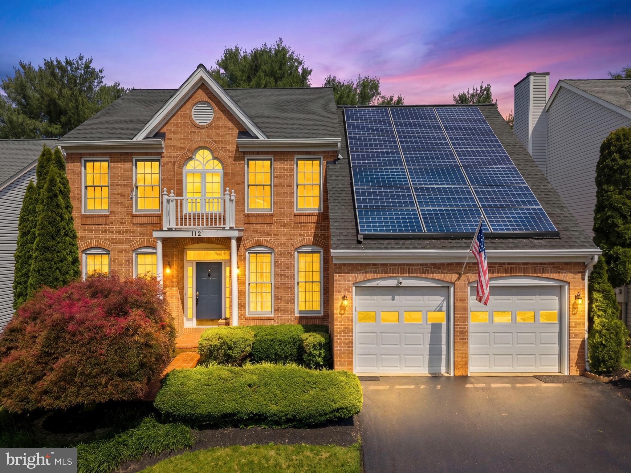 Welcome to this exceptional and rarely available residence in the highly sought-after Washingtonian Woods community. Offering a rare combination of luxury living, thoughtful updates, energy efficiency, privacy, community amenities, and income-generating potential, this meticulously maintained home presents a unique opportunity for buyers seeking both comfort and long-term value.

A grand two-story foyer introduces a beautifully updated interior designed for everyday living, entertaining, and flexible modern lifestyles. The gourmet kitchen features granite countertops, an expansive center island, abundant cabinetry, and a large pantry, combining functionality with timeless style. There is also potential to add a spacious deck, creating an ideal setting for outdoor dining and entertaining while overlooking the peaceful rear setting.

Adjacent to the kitchen, the impressive family room offers a soaring cathedral ceiling, a fireplace, and scenic views of the surrounding green space and mature trees, creating a private and tranquil backdrop. The main level also includes a formal dining room highlighted by a stunning chandelier, an elegant living room, and a private office, perfectly suited for today’s work-from-home needs.

Upstairs, the luxurious primary suite serves as a private retreat filled with abundant natural light. It features an attached sitting room, generous closet space, and a large walk-in closet. The beautifully renovated primary bath offers a spa-inspired experience with high-end finishes, dual vanities, designer details, and a new jacuzzi bathtub. Three additional bedrooms and a beautifully renovated hall bath with modern fixtures, updated finishes, and a second new jacuzzi bathtub complete the upper level.

The fully finished walkout lower level provides exceptional versatility and includes a fifth bedroom, full bath, spacious recreation room with wet bar, bonus room, and a dedicated daycare/business-use area. This income-producing lower-level setup offers tremendous flexibility for a home-based business, supplemental income, multigenerational living, guest accommodations, recreation, or entertainment space.

This home has been thoughtfully upgraded for efficiency, comfort, and long-term value. Major improvements include a newer architectural roof, updated dual-zone HVAC systems, newer gas water heater, energy-efficient windows and glass doors, and beautiful wide-plank luxury vinyl plank flooring throughout the lower level and family room. The property is further enhanced by a Tesla solar energy system with extra power to the grid and receiving cashbacks from Pepco, helping reduce utility costs while providing energy resilience and peace of mind during power outages.

Washingtonian Woods is known for its exceptional community amenities, including four recreational areas/parks, a community pool, clubhouse, tennis courts, and basketball court. The location is equally impressive, offering convenient proximity to Rio, Kentlands, Downtown Crown, the ICC, I-270, shopping, dining, entertainment, major commuter routes, and access to the newly constructed Crown High School.

Backing to a scenic, tree-lined green space and offering a rare blend of luxury, privacy, functionality, energy efficiency, community lifestyle, and income potential, this exceptional home is a standout opportunity in one of Gaithersburg’s most desirable communities.