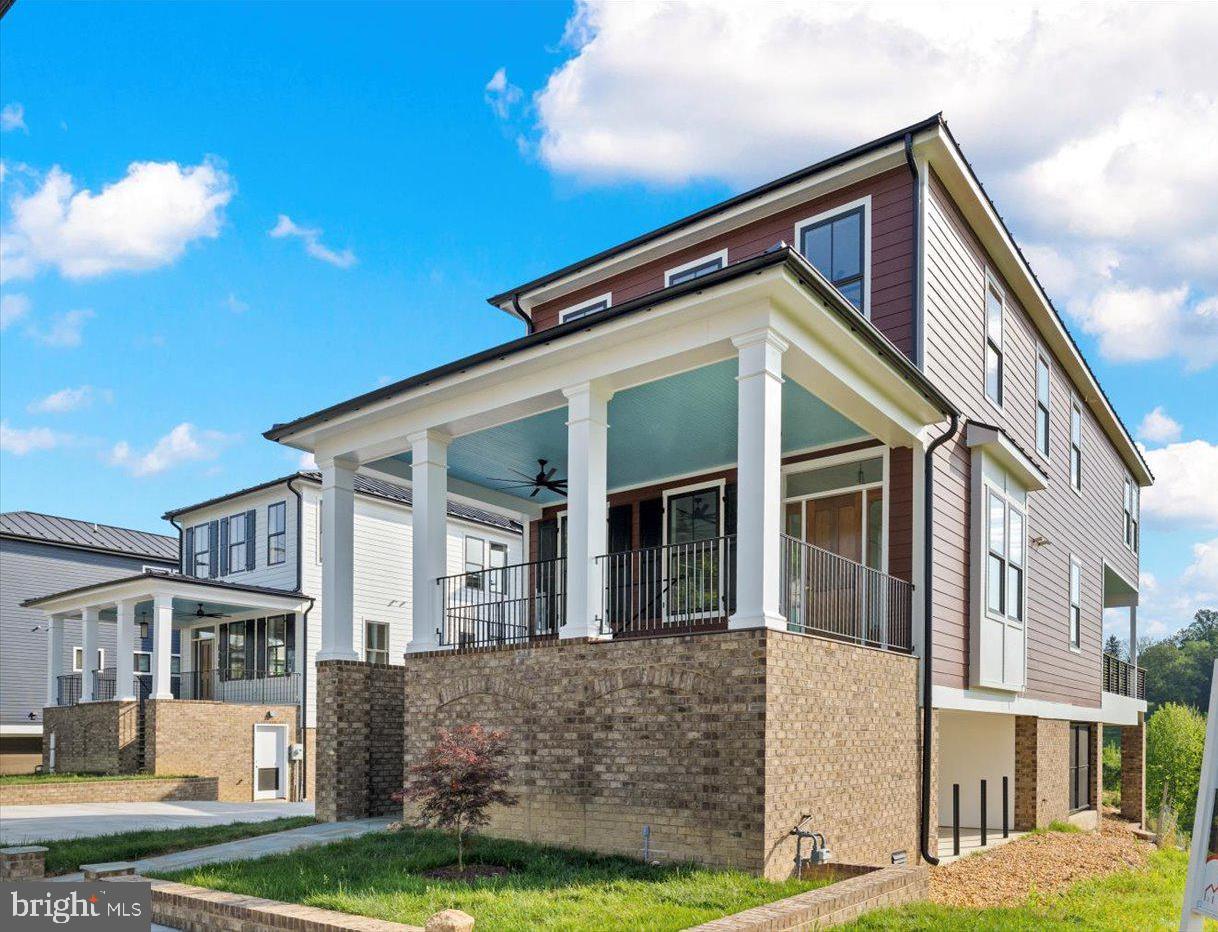 ****$350,000 LESS THAN WHEN ORIGINALLY LISTED.  NOW IS THE TIME TO BUY Waterfront luxury home w/ 3,400+ finished sqft of beauty from end to end! Situated on the banks of the Rappahannock on Sophia Street, a short walk to historic downtown Fredericksburg's plethora of shopping & dining amenities! Enter the massive driveway, multi-car garage & a huge covered patio w/ recessed lighting/optional additional off-street parking! The exterior boasts tremendous character w/ a beautiful standing seam metal roof, hardiplank siding, & custom brickwork on the front & rear! Enjoy an upgraded outdoor relaxation experience w/ a large covered front porch, a massive rear deck & private balcony off the upper-level owner's suite, unobstructed views of the river & historic Chatham Manor perched on the hill! Inside the garage, you will have access to an interior elevator that goes to the upper level! Through the door, you are greeted with/ an abundance of natural lighting from nearly 70 windows providing splendid views virtually anywhere in the home! Off the foyer through a set of French doors sits a large main-level bedroom/optional study w/ a tray ceiling, ceiling fan & recessed lighting, walk-in closet & full bath w/ a frameless shower w/ custom tiling & quartz vanity! Down the hall to the main living area, elegant crown moulding & trim are carried throughout, arriving to the main level elevator access as well as a convenient half bath! On the rear of the home, the extraordinary open floor plan opens up to the breathtaking river views, making indoor entertaining something to look forward to year-round! Magnificent gourmet kitchen is a true chef's delight w/ exquisite quartz countertops & a large center island & breakfast bar, high-end KitchenAid appliances, a double bowl farmhouse sink w/ gourmet faucet, upgraded cabinetry w/ black modern pulls, white subway tile backsplash, w/ a combination of recessed & pendant lighting! Large dining rm w/ plenty of space for dinner parties to come! A fantastic living room completes the main living space w/ a delightful coffered ceiling, recessed lighting & an oversized ceiling fan, in addition to the sliding glass doors to the rear deck & multitude of windows throughout, letting that spring & fall breeze flow through on a sunny day! The crown moulding & custom trim continue from the main-level entry to the upper-level hall, where you will also find the upper-level elevator access & laundry room! Start your day off w/ a view from the owner's suite, stepping out of bed & onto your private balcony looking out over the Rappahannock or from inside w/ the panoramic window views, recessed lighting, dual ceiling fans & a huge walk-in closet with custom, built-in storage! Moving into the luxury ensuite, quartz double vanities, massive walk-in shower w/ frameless glass door, rain shower & separate modern soaking tub, recessed lighting & custom tiling, private water closet & beautiful ceramic tile flooring! Finishing off the upper level, a spacious bonus area & the remaining bedrooms w/ walk-in closets & both w/ attached full baths that boast custom tiling in the shower & ceramic tile flooring! Do not miss this incredibly rare opportunity in downtown Fredericksburg!