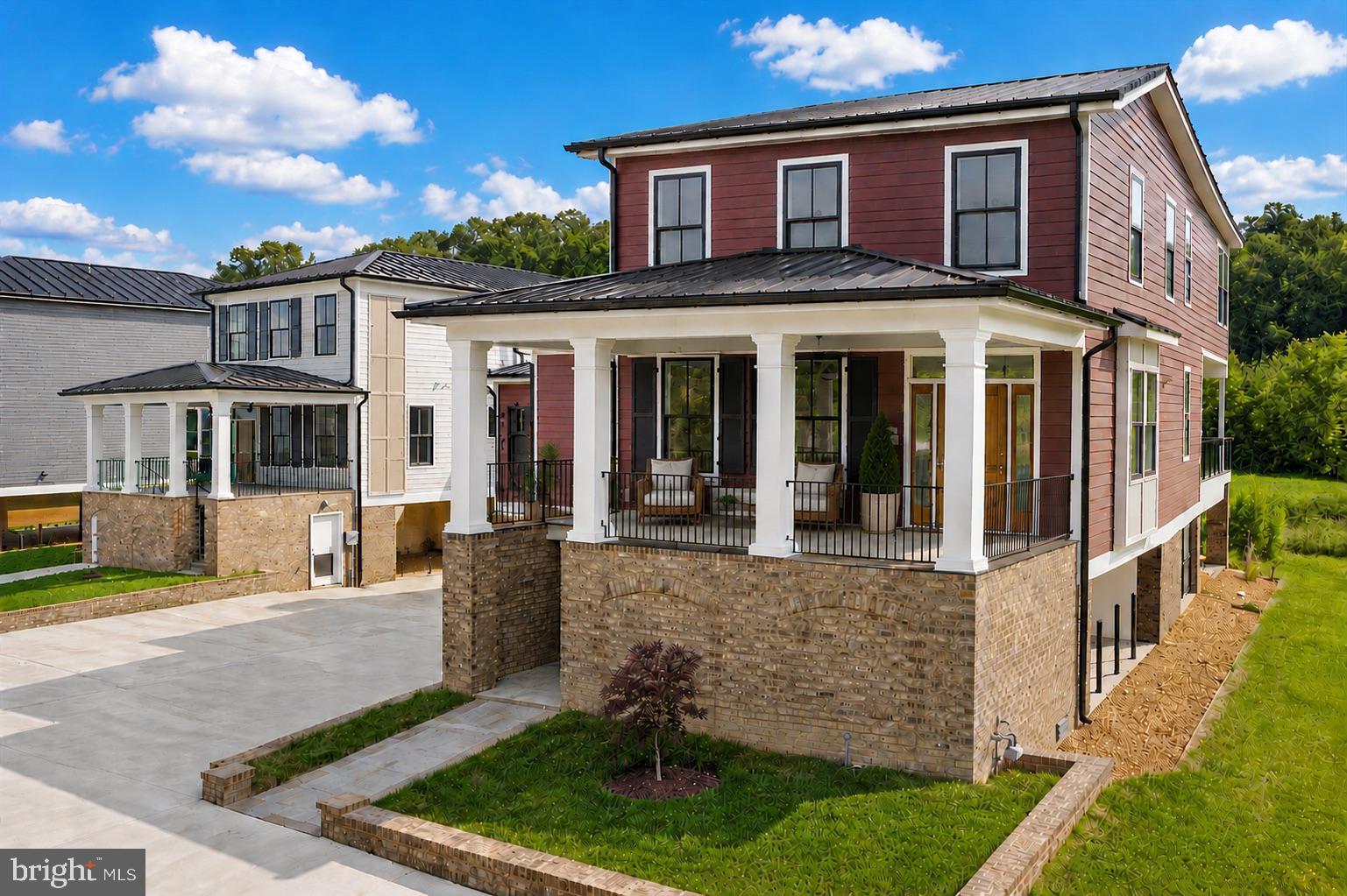 ****$350,000 LESS THAN WHEN ORIGINALLY LISTED.  NOW IS THE TIME TO BUY Waterfront luxury home w/ 3,400+ finished sqft of beauty from end to end! Situated on the banks of the Rappahannock on Sophia Street, a short walk to historic downtown Fredericksburg's plethora of shopping & dining amenities! Enter the massive driveway, multi-car garage & a huge covered patio w/ recessed lighting/optional additional off-street parking! The exterior boasts tremendous character w/ a beautiful standing seam metal roof, hardiplank siding, & custom brickwork on the front & rear! Enjoy an upgraded outdoor relaxation experience w/ a large covered front porch, a massive rear deck & private balcony off the upper-level owner's suite, unobstructed views of the river & historic Chatham Manor perched on the hill! Inside the garage, you will have access to an interior elevator that goes to the upper level! Through the door, you are greeted with/ an abundance of natural lighting from nearly 70 windows providing splendid views virtually anywhere in the home! Off the foyer through a set of French doors sits a large main-level bedroom/optional study w/ a tray ceiling, ceiling fan & recessed lighting, walk-in closet & full bath w/ a frameless shower w/ custom tiling & quartz vanity! Down the hall to the main living area, elegant crown moulding & trim are carried throughout, arriving to the main level elevator access as well as a convenient half bath! On the rear of the home, the extraordinary open floor plan opens up to the breathtaking river views, making indoor entertaining something to look forward to year-round! Magnificent gourmet kitchen is a true chef's delight w/ exquisite quartz countertops & a large center island & breakfast bar, high-end KitchenAid appliances, a double bowl farmhouse sink w/ gourmet faucet, upgraded cabinetry w/ black modern pulls, white subway tile backsplash, w/ a combination of recessed & pendant lighting! Large dining rm w/ plenty of space for dinner parties to come! A fantastic living room completes the main living space w/ a delightful coffered ceiling, recessed lighting & an oversized ceiling fan, in addition to the sliding glass doors to the rear deck & multitude of windows throughout, letting that spring & fall breeze flow through on a sunny day! The crown moulding & custom trim continue from the main-level entry to the upper-level hall, where you will also find the upper-level elevator access & laundry room! Start your day off w/ a view from the owner's suite, stepping out of bed & onto your private balcony looking out over the Rappahannock or from inside w/ the panoramic window views, recessed lighting, dual ceiling fans & a huge walk-in closet with custom, built-in storage! Moving into the luxury ensuite, quartz double vanities, massive walk-in shower w/ frameless glass door, rain shower & separate modern soaking tub, recessed lighting & custom tiling, private water closet & beautiful ceramic tile flooring! Finishing off the upper level, a spacious bonus area & the remaining bedrooms w/ walk-in closets & both w/ attached full baths that boast custom tiling in the shower & ceramic tile flooring! Do not miss this incredibly rare opportunity in downtown Fredericksburg! Some photos are virtually staged.