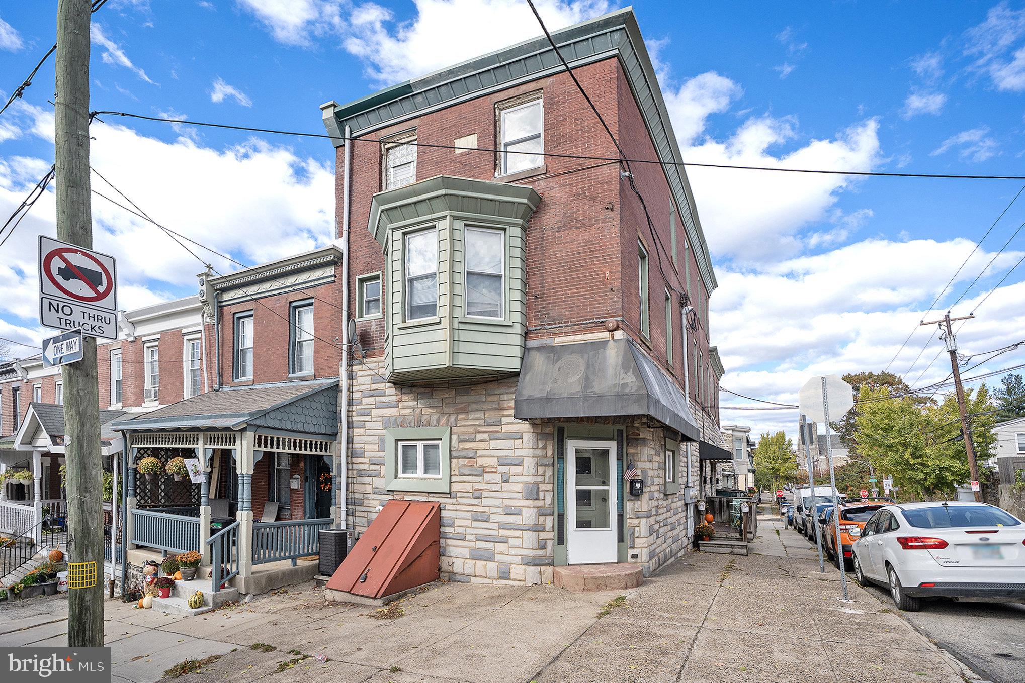 146 Vassar Street, a unique 4 unit property with 2 extra-large garages offering abundant storage or parking. 
Each unit has been thoughtfully designed with exposed brick walls, central air, forced air, trey ceilings, in unit laundry, and a mix of hardwood and carpeted flooring, creating a warm and inviting atmosphere that feels both stylish and comfortable.
This versatile property is perfect for an investor or owner-occupant seeking rental income potential in a desirable Philadelphia location and right by Wissahickon Train Station. This will require commercial lending.