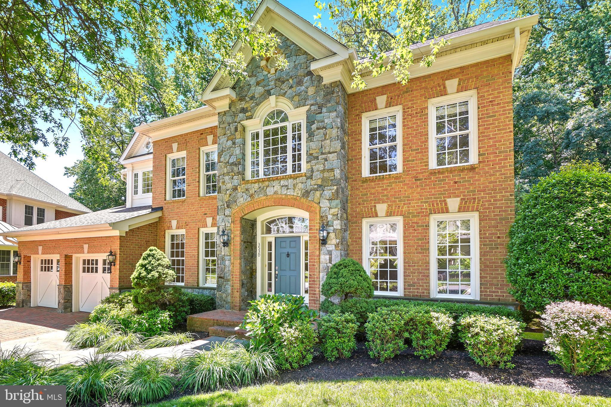 The moment you enter Pickett's Reserve you will know that you have entered somewhere special. This enclave of luxury custom built homes exudes class and style with their stunning and stately full brick and real stone masonry exteriors. The community features brick driveways, crosswalks, and lead walks- all connecting to paths winding through stone gazebos that lead to an adjacent 15 acres of Fairfax County parkland with access to more trails. This home features a premium wooded view lot and one of the most attractive full brick and stone exteriors in the community, boasting a unique stone recessed entry. Enter into a grand 2 story foyer that vaults throughout the 2nd floor pampering with natural light. Hardwood flows seamlessly throughout the main level opening to a gourmet kitchen with large butlers pantry and a mudroom. The adjoining family room delights with a wall of windows that show off the scenic wooded view- live the changing seasons. Escape to the 2nd level with dual staircases that take you to a large master suite that is sure to please! The upper level luxury laundry is an unexpected treat with full cabinets and counters with a treed view. The open and bright lower level features large windows and doors that bring that amazing treed view in. The spacious rec room with bar nook rough-in opens to a full bedroom with walk-in closet, a full bath and additional space for a theater room or office. This top Fairfax City location features top in the nation Fairfax County Public Schools. Location, Location- just a few miles from the Vienna Metro, 495, 66, Tysons Corner, the Mosaic District, Fairfax Inova Hospital and Historic Fairfax City. Luxury awaits...