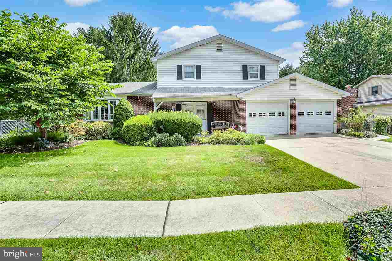 This split level home is located in the CV School District. Relax in the living rm w/ bay window, gather in the dining rm or dine in the eat in kitchen, or spend time in the lrg family rm w/ fireplace. The possibilities are endless in this spacious home. Upstairs is the mstr suite w/ two spacious closets, and full bth, 2 other bdrs and lrg full bth. Attached to the home is a beautiful sun rm, and 2 car attached garage. Outside entertaining is no problem w/ the lrg fenced in yrd, a great place to put a pool.