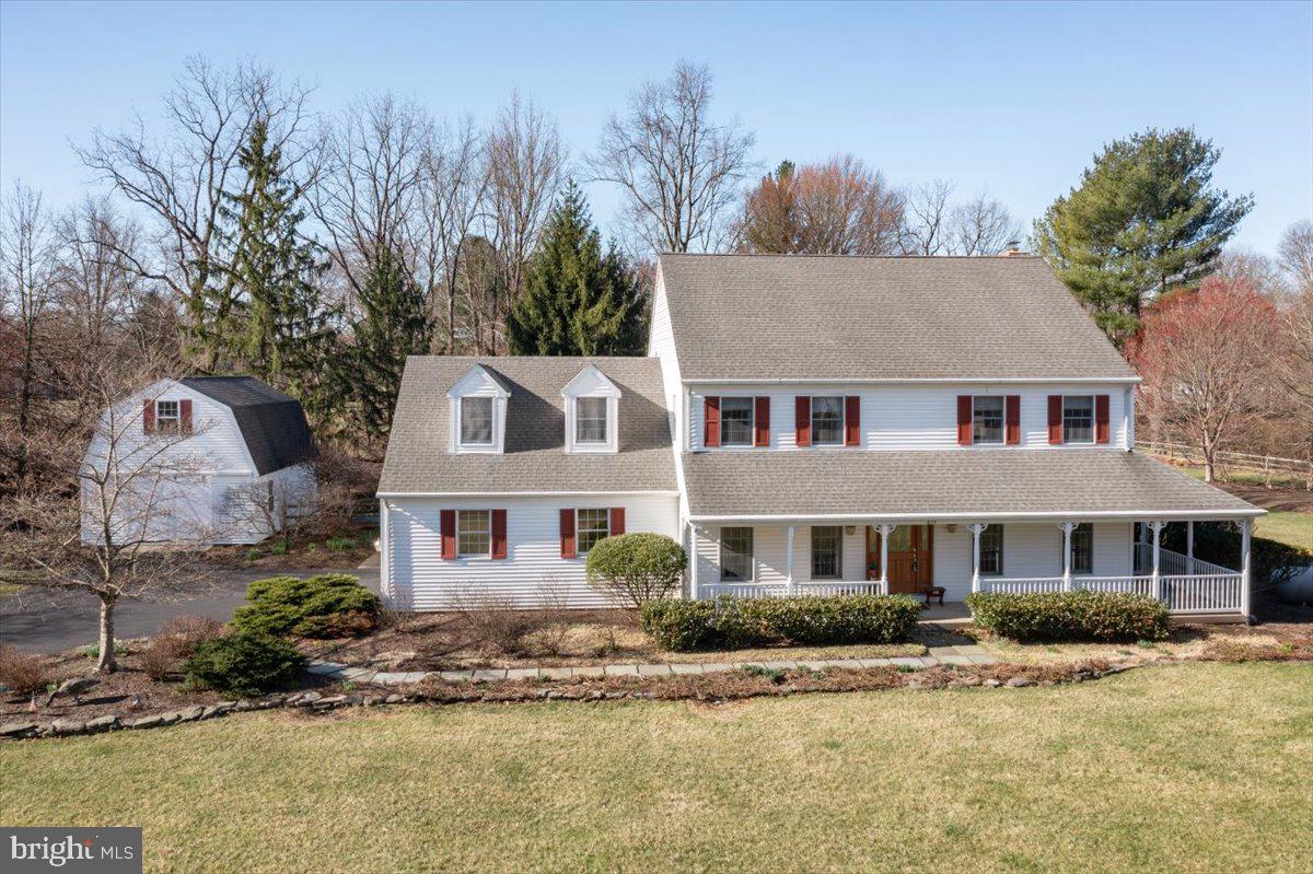 This charming Farmhouse Reproduction, built by renowned local builder George Michael, seamlessly blends classic design with modern functionality. Known for his quality craftsmanship and thoughtful layouts, Michael’s homes are highly regarded in the Doylestown area. With 3,391 square feet of interior space and 1.54 acres of picturesque surroundings, this property offers the perfect balance of room to live, entertain, and enjoy the outdoors.
Hardwood floors run throughout the home, adding warmth and character to every room. A thoughtfully designed addition expands the first floor, creating an oversized family room that feels both spacious and inviting. A stunning Palladian window fills the space with natural light, while a raised-hearth brick fireplace serves as the perfect focal point for cozy gatherings.
Bonus spaces add both functionality and charm... a first-floor office provides a quiet retreat for work or study, and the private balcony off the sitting room area of the primary suite is the perfect spot to enjoy your morning coffee.
The home is also energy-conscious, with solar panels on the rear roof that help keep electric costs remarkably low. Outdoor enthusiasts will love the expansive rear yard and the versatile barn/garage outbuilding, which offers additional parking and storage beyond the attached two-car garage. A separate shed provides even more convenience for tools and equipment.
Set back from the road, this home offers a peaceful retreat, yet it’s just minutes from the heart of Doylestown and all it has to offer—shopping, dining, culture, and top-rated schools. Don’t miss the opportunity to make this exceptional property your own!