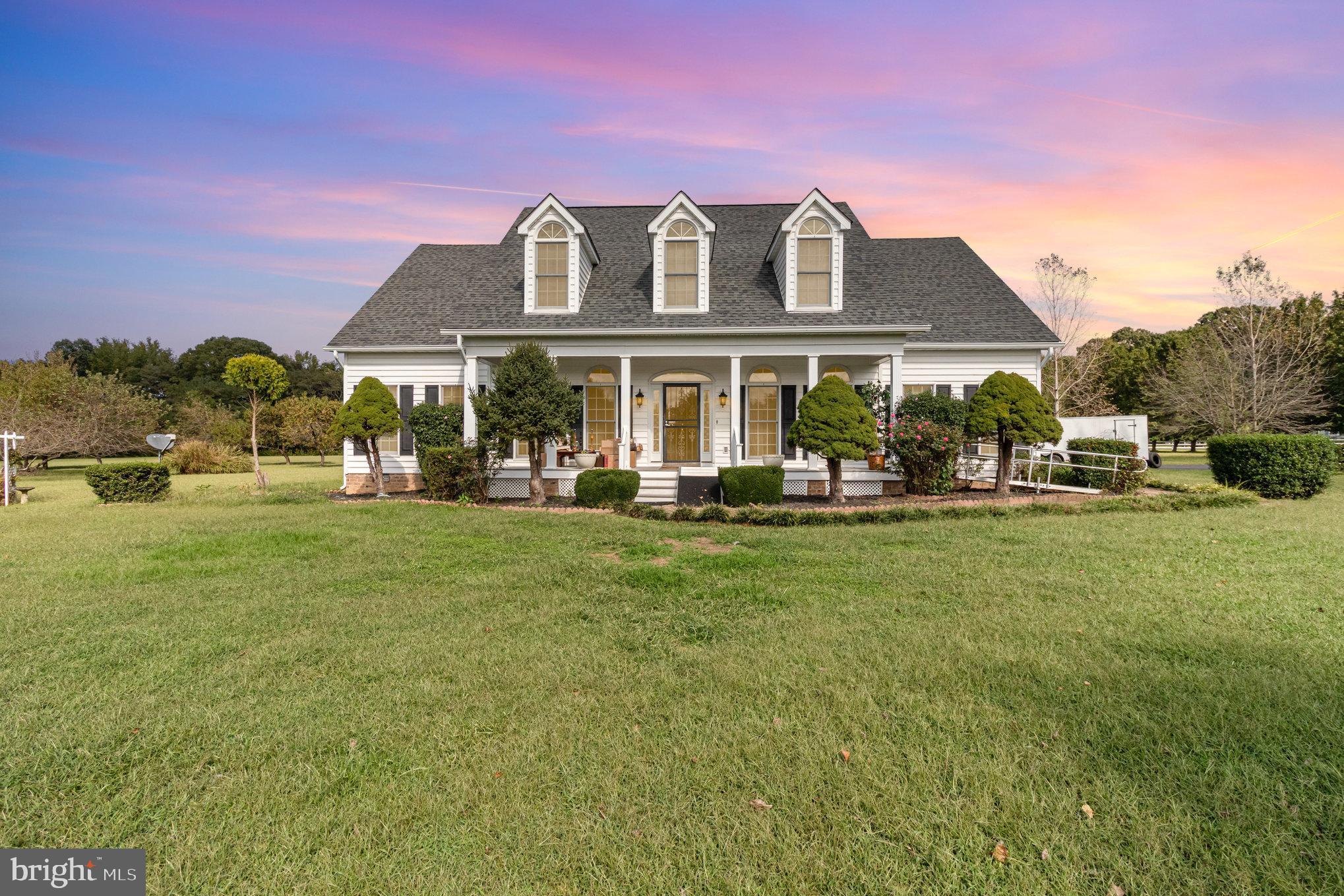 MOTIVATED SELLER has found their new home and are in the process of moving out. Some rooms are now vacant, however, pictures reflect both occupied and empty. County tax record is wrong on the square footage the correct amount it 4168 . This  Southern Living designed home is the perfect blend of luxury and country living in the sought after community of the Meadows of Dahlgren.  You will be impressed from the moment you drive in the driveway of the level 10.74 acres that would be perfect for your horses or to just enjoy Mother Nature at her finest.  Greet your guests on the Rocking chair front porch overlooking your beautiful spread. Once you enter you will notice all of the attention to detail such as 10 ft ceiling, crown molding, chair railing, and more that you would expect from a custom-built home. A formal living room and dining room are perfect for holiday gathering and entertaining. The fireplace is the focal point of the spacious family room with soaring ceilings and leads to a sunroom for added space to relax and overlook this peaceful setting. The heart of the home is the kitchen, which is a chefs dream with its granite countertops, gas cooktop, wall oven, island, and tons of counterspace and pantry storage. The first-floor primary bedroom with luxurious ensuite featuring jetted tub, separate shower and dual sinks. A second bedroom, two full baths and laundry room complete the first floor. Upper-level features 2 oversized bedrooms with a jack and jill bath. and a 5th bedroom all with walk in closets.   An additional 23x15 room could be used as a game room, media room, playroom, office or make it a 6th bedroom. Store all of your holiday decorations in the walk-up floored attic space or extra storage shed. There is water access for boating, kayaking, swimming at the HOA community dock with picnic area just a short distance away. This home with all of the extras makes it the perfect place to call home.