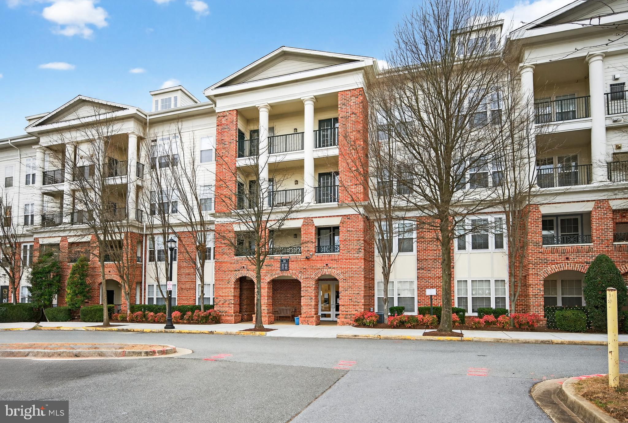 Freshly painted with new carpet in the bedrooms, this beautiful condo is located in the highly sought-after Colonnade building in the heart of Kentlands. Two assigned garage parking spaces.. The home features high ceilings and an open floor plan with two bedrooms and two full baths. The interior offers a spacious family room with hardwood flooring, a breakfast/dining area, and a gourmet kitchen complete with granite countertops, stainless steel appliances, and a gas range. Both generously sized bedrooms include large walk-in closets and en-suite full bathrooms. Enjoy outdoor living on your private balcony with peaceful views of lush foliage. The Colonnade at Kentlands provides a vibrant community lifestyle with exceptional amenities, including a two-level fitness center, library, swimming pool, and multiple social spaces. Ideally located just steps from shopping and dining in Kentlands, Crown, and Rio, with easy access to I-270 and more. Don’t miss the opportunity to make this exceptional condo your new home. Schedule your showing today and experience the best of Gaithersburg living! This unit includes two assigned garage parking spaces (#133 and #348).  HVAC (2025).