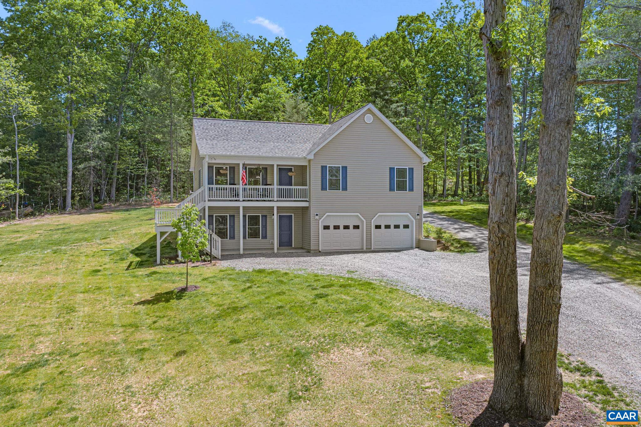 This gorgeous, thoughtfully designed home offers a perfect balance of comfort, style, and potential. With 3 well-sized bedrooms and 2 full bathrooms, the layout is designed for easy, everyday living, featuring a bright and open main living space that brings the kitchen, dining, and living areas together. Start your mornings on the welcoming front porch, and unwind in the evenings on the back deck surrounded by natural beauty. The large basement includes a drive-in garage and expansive unfinished 1,000 sq ft space with tall ceilings?ready for your vision, whether that?s additional living space, a home gym, or workshop. New construction, serene setting, and room to grow?an opportunity like this doesn?t come around often.,Granite Counter,Wood Cabinets