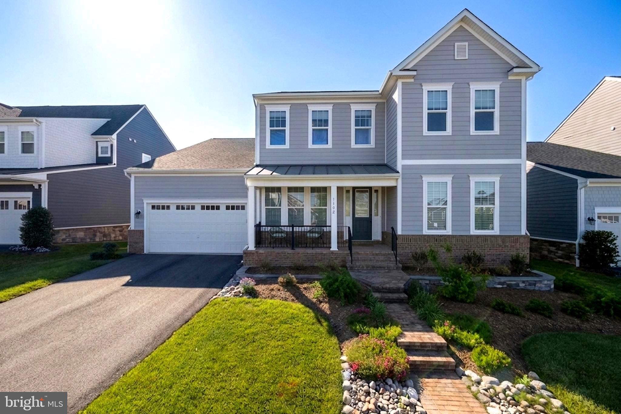 Nestled in the highly sought after Meadowbrook Farm community, this exceptional Oatland model showcases a thoughtfully designed open concept layout that blends refined elegance with effortless everyday living. At the heart of the home is a light filled living space, perfect for both relaxing and entertaining. The impressive two-story family room creates a sense of openness and grandeur, while rich hardwood flooring flows seamlessly throughout the main living areas. The gourmet kitchen serves as a true centerpiece, featuring luxurious granite countertops, a stylish backsplash, extended cabinetry, and a spacious center island, ideal for casual dining or hosting gatherings with ease. Enjoy the convenience of a main level primary suite, offering comfort, privacy, and easy living, complete with its own mini-split system for personalized heating and cooling. Outdoor living is just as inviting, with a low maintenance Trex deck perfect for morning coffee or unwinding in the evening. The expansive unfinished basement offers endless possibilities, whether you envision a home theater, fitness studio, or additional living space, it’s ready for your personal touch.

Meadowbrook Farm is an award-winning community of thoughtfully designed single family homes inspired by the charm of rural Virginia. Residents enjoy a lifestyle centered around connection and convenience, with amenities including a pool and pool house, parks, open green spaces, walking trails, and sidewalks throughout. Located just minutes from the shops, restaurants, galleries, and charm of Historic Downtown Leesburg, this home offers the perfect balance of tranquility and accessibility.