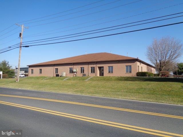 10,000+ square foot office building across the street from the Carlisle Regional Medical Center (Carlisle Hospital). Currently under lease through 9/30/21 with (2) 5-year options with tenant. Gross lease with 3% increases per option period. Tenant is PA Career Link. Over 100+ parking spaces available. See associated docs for additional info.
