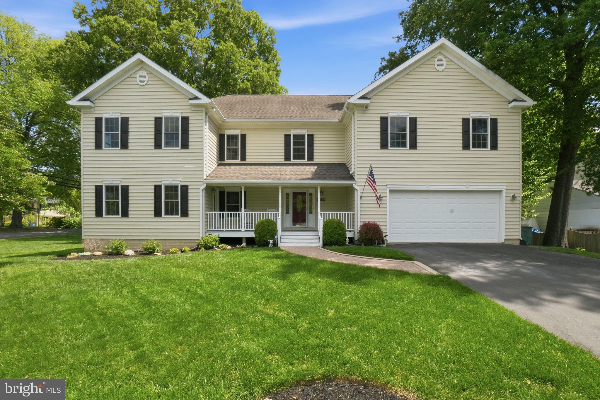 Exceptional Custom Colonial in the Heart of Mount Vernon–Fort Hunt. Nestled on a beautifully landscaped corner lot in the highly desirable Mount Vernon–Fort Hunt community, this exceptional owner-built Colonial offers the perfect blend of timeless craftsmanship, generous living spaces, and modern updates. Built in 2004 with pride and attention to detail, this impressive residence delivers two finished levels of elegant yet comfortable living designed for today’s lifestyle. From the moment you enter, you’ll appreciate the home’s soaring 9-foot ceilings, rich crown moldings, abundant natural light, and thoughtfully designed open floor plan. The spacious family room flows seamlessly into the gourmet kitchen, creating an ideal setting for both entertaining and everyday living. The kitchen is a chef’s dream, featuring stainless steel appliances, a double wall oven, built-in gas cooktop, expansive center island, breakfast area, and 42" cabinetry including a dedicated stand mixer cabinet. The home offers five generously sized bedrooms, an office, a loft that can easily function as an additional bedroom, three full baths, and two half baths, along with the convenience of two 2nd level laundry rooms and 3 zones of hvac. The luxurious primary suite serves as a private retreat with a walk-in closet and spa-inspired bath complete with a double jetted soaking tub, walk-in shower, and dual vanities. A truly rare feature is the private two-level suite with a separate entrance, offering exceptional flexibility for multigenerational living, extended guests, a home office, or potential rental income. The range, (not connected), will need a permit to connect to complete second kitchen. The expansive 1,900+ square foot unfinished walk-out basement includes rough-in plumbing for a future bath and provides endless possibilities for customization, whether envisioned as a recreation room, gym, media space, or additional living quarters. Recent Improvements Since 2023 Include:• Fresh interior paint throughout• Newly refinished 4" hardwood floors• New carpet• New kitchen appliances• LED lighting upgrades• New water heater• New heat pump• New smoke detectors• New storm door. Outdoor living is equally impressive with a shaded rear deck featuring low-maintenance TREX decking overlooking a lush backyard with mature landscaping, garden space, and a fire pit—perfect for relaxing or entertaining year-round. A charming front porch, elegant exterior lighting, and an oversized attached two-car garage with built-in storage complete the home’s exceptional appeal. Ideally situated on Vernon Avenue in the heart of the Mount Vernon–Fort Hunt area, this home offers immediate access to Fort Hunt Park, the Mount Vernon Trail, and miles of Potomac River recreation. Enjoy a scenic commute via the George Washington Memorial Parkway with quick access to Old Town Alexandria, Reagan National Airport, and Washington, D.C. Nearby shopping, dining, parks, schools, and Fairfax County recreation amenities provide everyday convenience, while the surrounding historic and natural landscape creates an unmatched sense of place. This remarkable home offers the rare combination of space, flexibility, thoughtful updates, outdoor enjoyment, and an unbeatable Northern Virginia location—a truly exceptional opportunity in Mount Vernon.