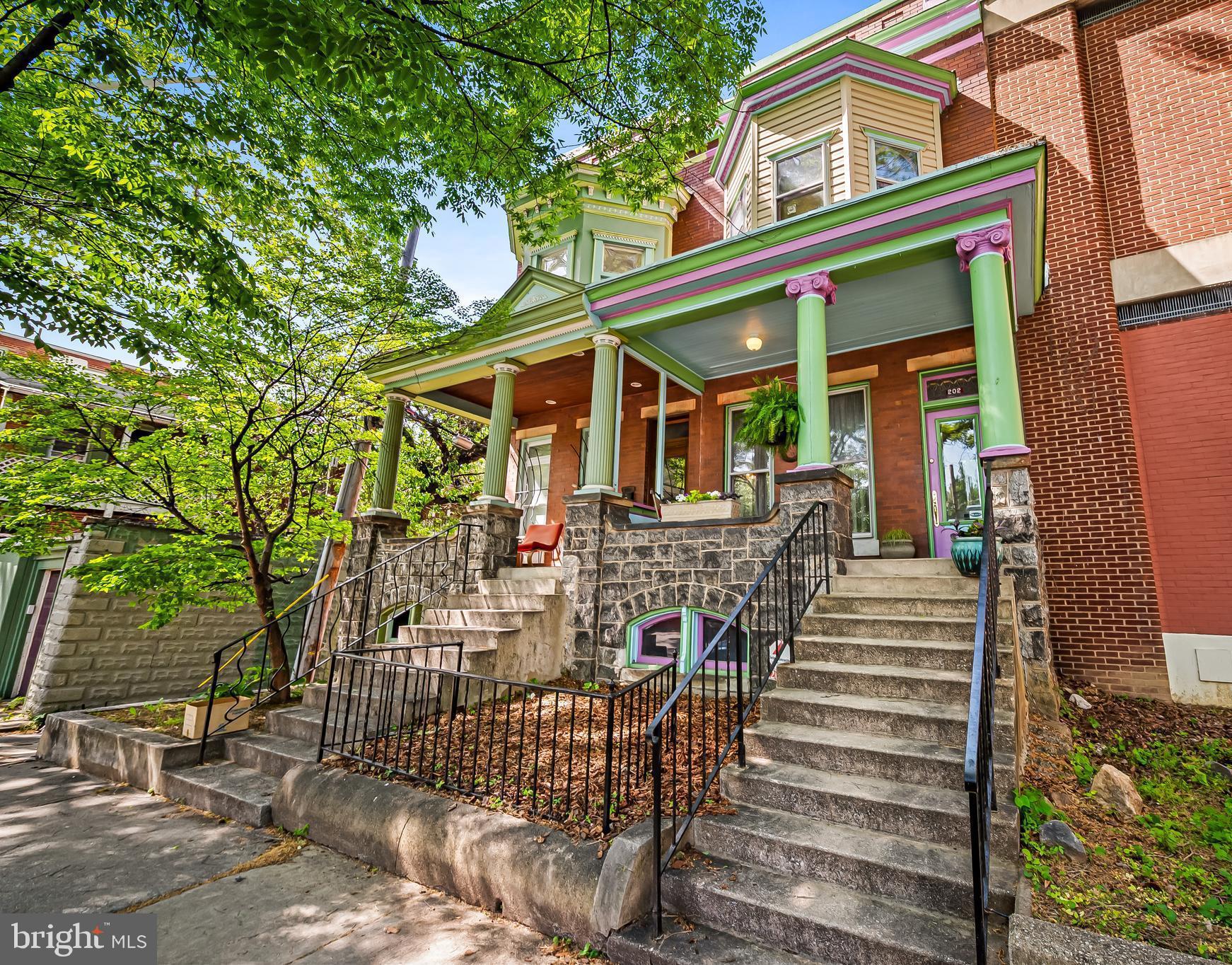 202 E. 31st Street offers a rare opportunity to own a lovingly maintained Painted Lady in the heart of Charles Village. Tucked along a quiet side street and cherished by the same owner for the past 48 years, this remarkable residence is filled with historic character, generous space, and endless potential for its next chapter.

A welcoming covered front porch sets the tone, leading into an interior rich with original architectural details, including beautiful wood floors, parlor walls, four custom stained glass windows, original built-in wood closets, and a gracious staircase illuminated by a center hall skylight. The separate dining room is anchored by an elegant fireplace mantle that serves as a striking focal point.

The main level retains its original layout and includes a flexible sitting room/breakfast room that could continue as a cozy retreat or offer the perfect opportunity for a home office, pantry expansion, or the future addition of a laundry room and half bath. The light-filled kitchen showcases the home’s original sink, cabinetry, and pantry. While the previous deck has been removed, the next owner could easily add a new deck or screened porch to create additional indoor/outdoor living space.

Upstairs, the elegant front-facing primary bedroom features stained glass windows and closets with original woodwork. A generously sized middle bedroom offers flexibility for family, guests, or a quiet home office. The hall bathroom retains its timeless charm with original tile, a clawfoot tub, and pedestal sink.

Originally designed as a four-bedroom home, the current layout combines the rear two bedrooms into a dramatic artist’s studio filled with beautiful north-facing light from overhead skylights — an inspiring setting for creative pursuits, a yoga studio, home office, or future restoration into a fourth bedroom if desired.

The walkout basement features unusually high ceilings and a full original bathroom, currently providing excellent storage and laundry space while offering exciting potential for additional finished living space in the future.

Outside, the extra-large rear yard offers abundant room for gardening, entertaining, or play. A one-car parking pad is already in place, with ample space to easily create a second parking spot if desired.

Ideally located in the heart of Charles Village, the home offers convenient access to the Saturday farmers market, neighborhood shops, grocery stores, cafés, breweries, and restaurants. Nearby amenities include the Enoch Pratt Free Library, the YMCA of Central Maryland, the Baltimore Museum of Art, and Wyman Park. Convenient to Johns Hopkins University Homewood campus, MedStar Union Memorial Hospital, public transportation, and the JHU shuttle.

Full of warmth, history, and possibility — and with only three owners since 1914 — 202 E. 31st Street is the kind of home that rarely becomes available, ready for its next owner to honor its past while creating its next chapter.