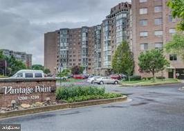 Lovely two bedroom, two bathroom  unit in  upscale building in  popular 55+ gated community.  NEW PAINT & NEW CARPET.  Enjoy all of Leisure World's amenities and social calendar.    Nine foot ceilings,  open floor plan with breakfast bar,  BALCONY access from THREE points; both bedrooms and the main living area   Walk-in closet, large additional closets,   Tons of kitchen cabinets &  storage.   Separate laundry room in the unit.   Enjoy the perfect 6th floor view, not too high, not too low.  There is plentiful parking in a huge lot, never a problem!   Very reasonably priced golf memberships available.  The building offers social activities such as movies, lectures, bridge, mahjong and other games,  dinner parties, book clubs and more.     The Leisure World Community offers two  clubhouses, interfaith chapel, golf, three restaurants, cocktail lounge, on-site medical/dental center, tennis, fitness center, swimming, shuttle buses and dial-a-ride cars and SO MUCH MORE!   All included in your monthly rent.   Close to ICC and major thoroughfares.