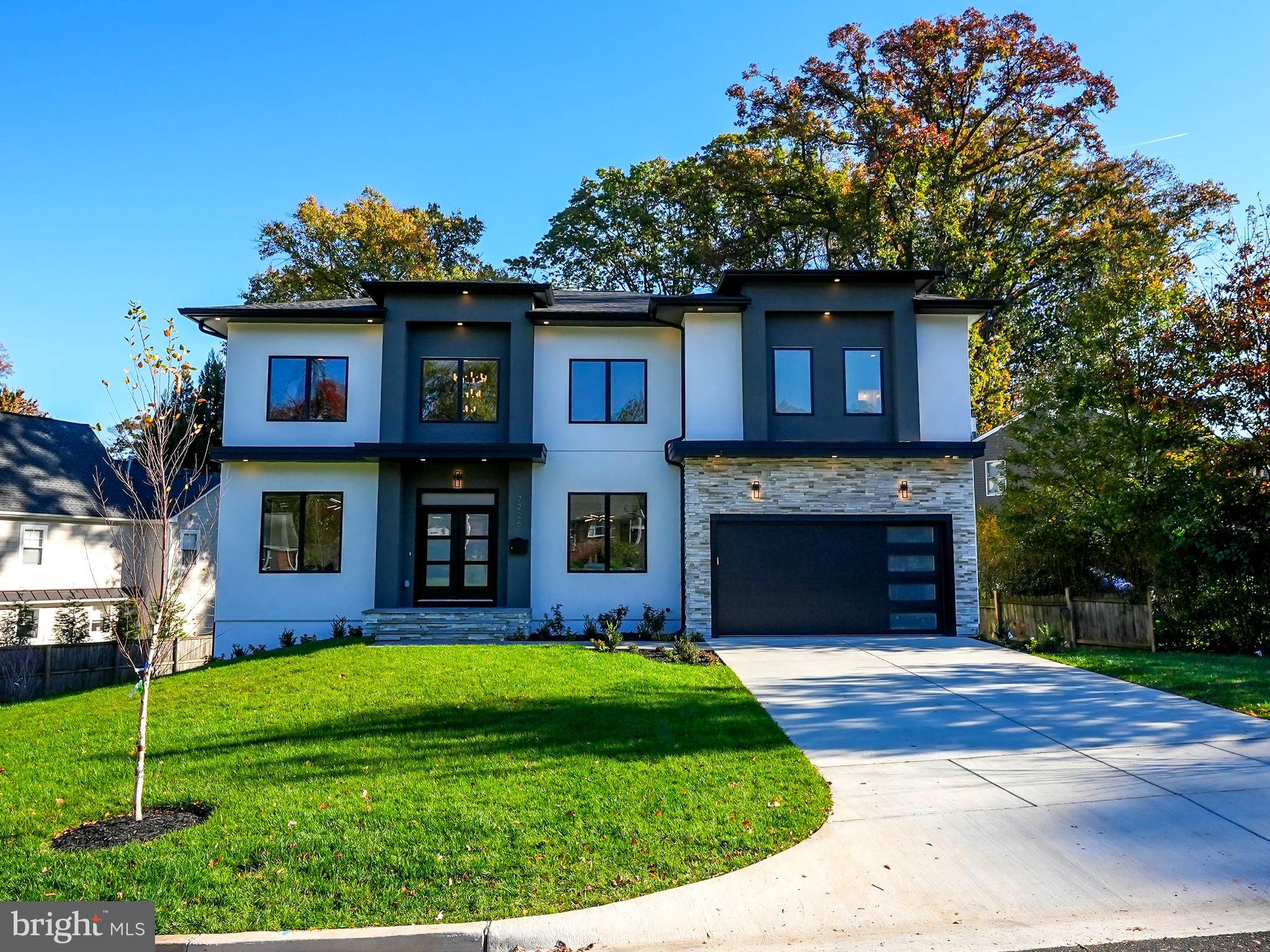 Move-In Ready! Mclean High School! Welcome to the epitome of modern elegance: a pristine prairie-style residence crafted by Green Valley Custom Builders. This contemporary haven of over 5,750 square feet is a testament to luxury, design, and comfort.

The home welcomes you with soaring ceilings – 10 feet on the main level, 9 feet upstairs, and a gracious 8 feet 9 inches in the fully finished basement. It features six expansive bedrooms and six opulent full baths, alongside a chic powder room. The attached 2-car garage and walk-out basement amplify convenience, while the Pella Lifestyles Series windows bathe the space in light.

Function meets form in the mudroom, complete with a cozy bench and custom cubbies. Each step through this residence reveals meticulous attention to detail, from the solid oak hardwood floors to the stunning 2-story foyer that sets a modern yet inviting tone.

The formal living and dining areas are a showcase of sophistication, ready to host your most memorable gatherings. Culinary dreams come to life in the gourmet kitchen, boasting premium KitchenAid stainless steel appliances, and a spacious walk-in pantry.

The family room, anchored by a striking direct vent gas fireplace, is the heart of the home—a space designed for comfort and style.

The second floor is a realm of relaxation, featuring a sumptuous owner's suite with a tailor-made walk-in closet, a luxurious soaking tub, and a sleek glass shower. Three additional bedrooms, each with their own private bath, offer personal retreats full of natural light.

The basement is an entertainment paradise, complete with a wet bar, an exercise room, a media room, and an additional large bedroom with an en-suite bathroom.

This home is a testament to architectural brilliance and offers a Builder's Limited Warranty at closing for your peace of mind. Prepare to be captivated by this modern marvel—where luxury is realized in every detail.

Located in the sought-after vicinity of Falls Church, this residence is conveniently close to major routes, shopping centers, malls, and restaurants. Only 20 minutes to DCA and 30 minutes to Dulles Airport, the property ensures that travel will be the least of your concerns. Tysons Mall is a mere 10-minute drive, while the Mosaic District is just 7 minutes away, providing a wealth of shopping and dining options. The Kennedy Center, accessible in 20 minutes, offers an array of cultural events. For the active lifestyle, the W&OD Trail is within a 5-minute biking distance, perfect for those morning jogs or leisurely weekend bike rides. This home not only offers luxury living but also the convenience of a prime location.