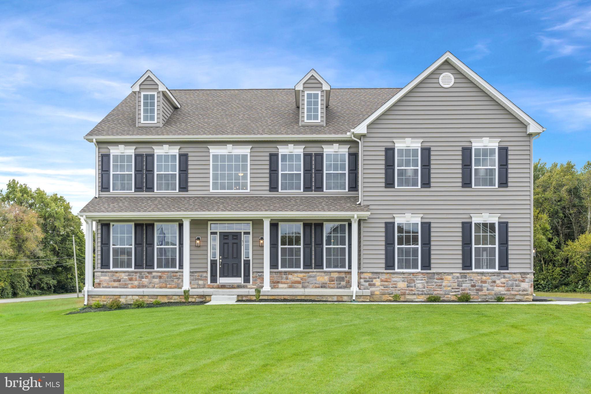 This stunning luxury home brings flexibility and grandeur to family living. The Brandywine features a two-story foyer and family room, a spacious kitchen and breakfast area, formal living and dining rooms, and a first-floor study. A rear staircase leads to the dramatic owner's suite with dual walk-in closets, a spacious sitting room, a luxury bath with a corner soaking tub, and separate linen and water closets.
The photos are of a similar home. They are for marketing purposes only and are not of the actual house. County, city, and school taxes, assessment value, and square footage are approximate. This is a to-be-built home. The price shown is the base price before adding additional options. For further information about this to-be-built home, visit the model home in Hidden Brook-1153 Charleston Circle Dover. If you are working with a realtor, the agent's client must acknowledge that a realtor is representing them during their first interaction with JS Homes, and the realtor must accompany their client on the first visit.