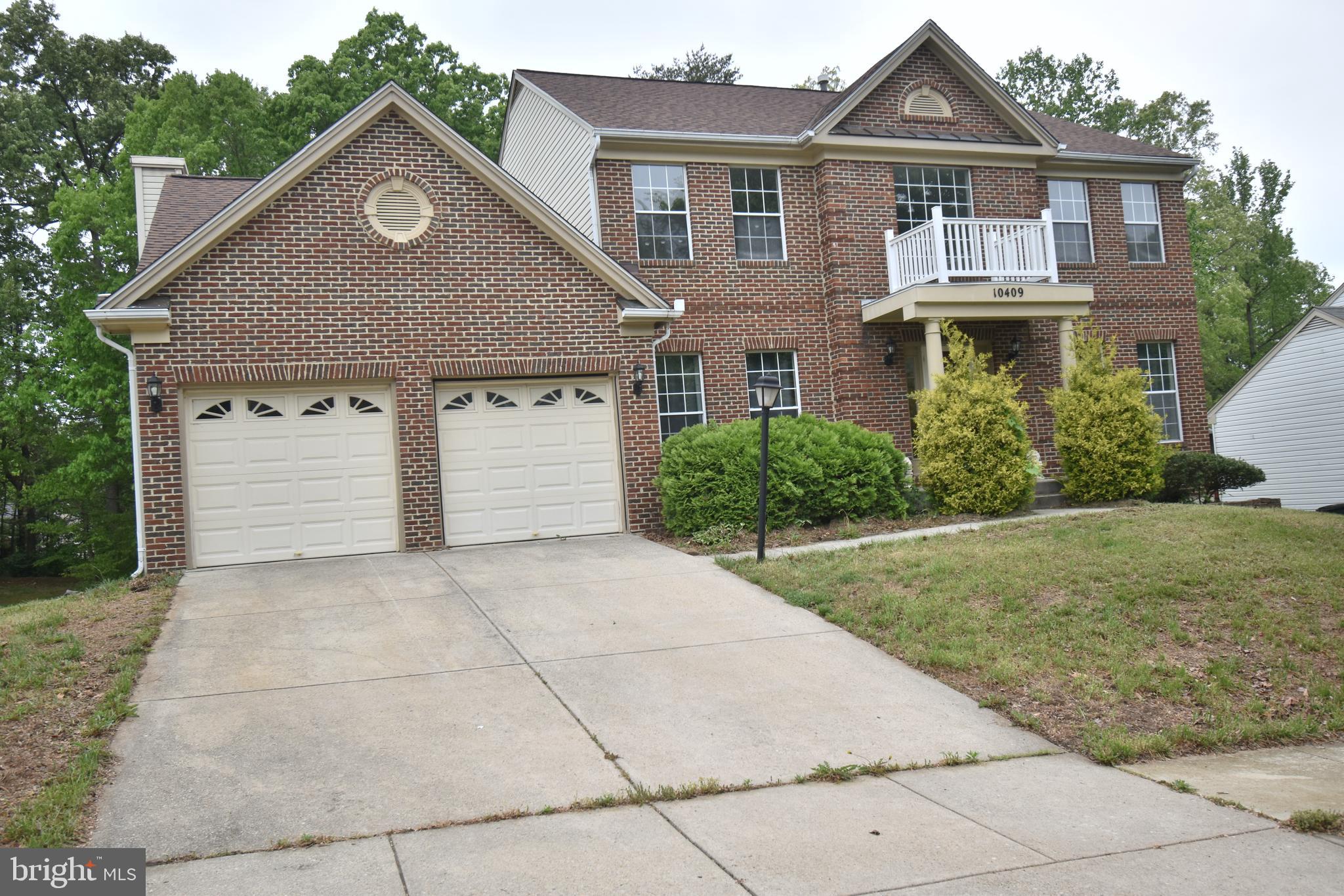 HUGE brick front Colonial with over 4,000 square feet of finished space!  There are hardwood floors throughout most of the first level which includes a spacious kitchen and step down family room with fireplace.  A sliding glass door provides access to a deck overlooking the rear yard.  The upper level boasts a very large primary suite and 3 additional bedrooms.  The lower level is already finished with a rec room, study/office, additional bedroom and full bathroom.   If space is what you seek this home has it!