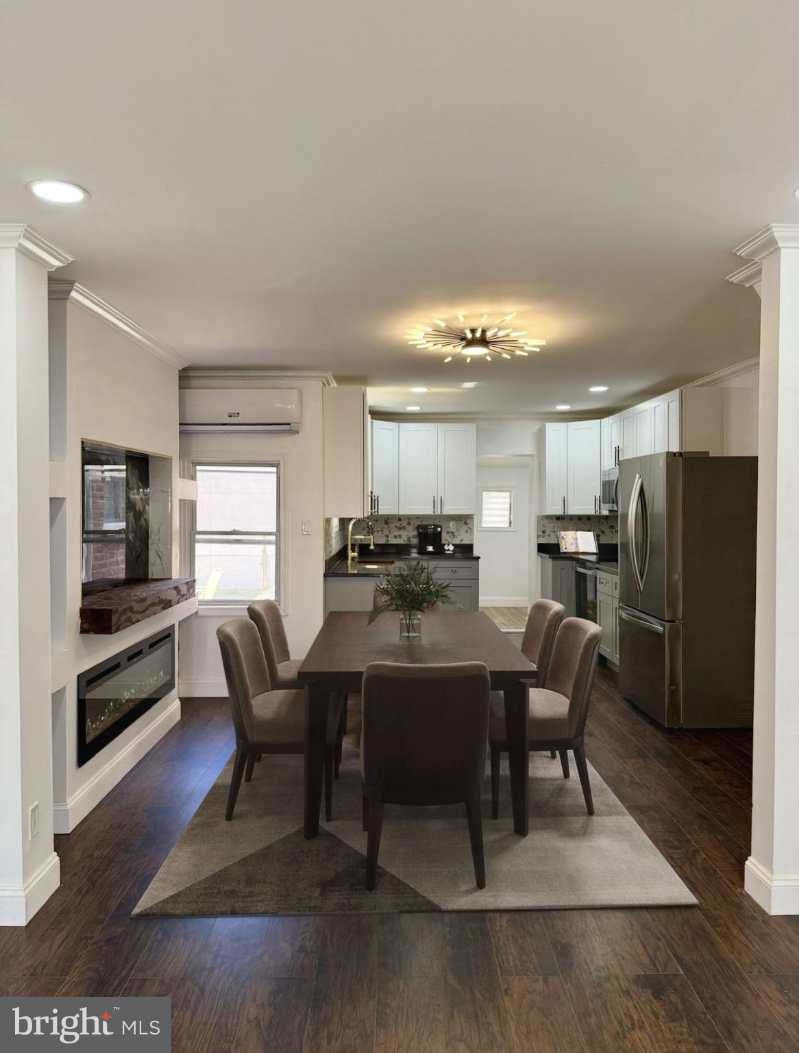 BACK ON THE MARET (through no fault of the seller). Welcome to 6824 Rodney Street — a stunningly renovated residence where modern design meets everyday comfort. This 3-bedroom, 2-bathroom home has been reimagined with sophisticated finishes and thoughtful upgrades throughout.
The first floor features engineered hardwood flooring and an open living area anchored by a sleek electric fireplace set against a striking full-slab granite face. Smart lighting with three customizable temperatures allows you to create the perfect ambiance in every part of the home.
Comfort is effortless with five high-performance mini-split units, giving each room its own climate control. Every unit was carefully selected with more than enough capacity to ensure efficient, consistent comfort year-round.
The kitchen is a chef’s dream, showcasing quartz countertops, brand-new appliances, modern cabinetry, and a chic design that flows seamlessly into the dining and living spaces. Upstairs, with all new carpet throughout, three inviting bedrooms offer comfort and style, complemented by a beautifully updated bathroom with modern fixtures. 
The finished basement with its own full bathroom and porcelain floor tiles provides versatile living options—perfect as a home office, playroom, lounge, or wellness space. Outside, your private backyard offers the ideal retreat for relaxing or entertaining, and it can also be converted into a driveway for private parking.
Every detail of this home has been carefully curated to balance modern elegance with functionality. Don’t miss your chance to own this move-in-ready gem on Rodney Street.
