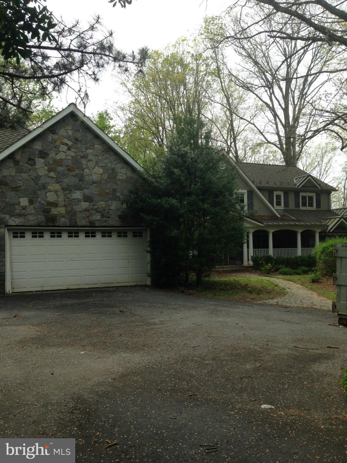This house is a shell, bank owned ans strictly sold in as-is condition. Beautiful wooded lot bring your architect and contractor.