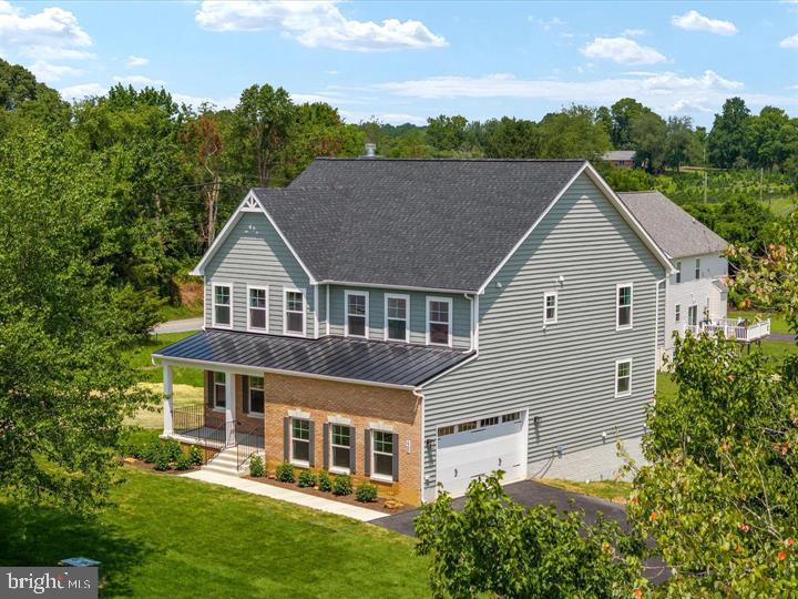 Gorgeous custom home that sits on a private wooded 4.95 acre lot.  All the upgrades to this Patuxent model are included. SEE THE SOLD PATUXENT MODEL BY THE SAME BUILDER AT 1631 COLONIAL OAK COURT HUNTINGTOWN FOR MORE PICTURES OF A FINISHED PRODUCT !!!!!   Gourmet kitchen features cultured marble counters and island with cooktop, stainless steel appliances, double wall ovens and 42" cabinets.  Seating and shelving in the mud room off of the garage.  Library/office/kids room .  9 ' Ceilings. Chair railings/crown molding in dining room. Custom trim package.  Sprinkler system/smoke detectors throughout.  Family room off of the kitchen has a wood burning fireplace for warm and cozy winters.  Deck for entertaining family/friends and those cook-outs  we all look forward to ! Enjoy the huge master bedroom with walk-in  his & hers closet.  The master bath has a separate soaking tub/walk-in shower and a double vanity. Rough-in in the basement to have finished  to your preferences.  A possible second family room, a 5th bedroom w/full bath, home gym, craft room or even an in-law suite:).. Minutes to shopping, restaurants, parks, recreations and so much more..   Get in early so you cand choose your home selections to include, brick/siding, flooring, cabinet colors, counter tops, carpet, etc..  Convenient to AAFB and Pax River !! PLEASE NOTE: HOME IS NOT BUILT AND THE PICTURES ARE OF PREVIOUS PATUXENT MODELS THAT SHOW DIFFERENT SELECTIONS TO BE MADE TO YOUR NEW HOME!!!!!!!  PERMIT READY !!!!!