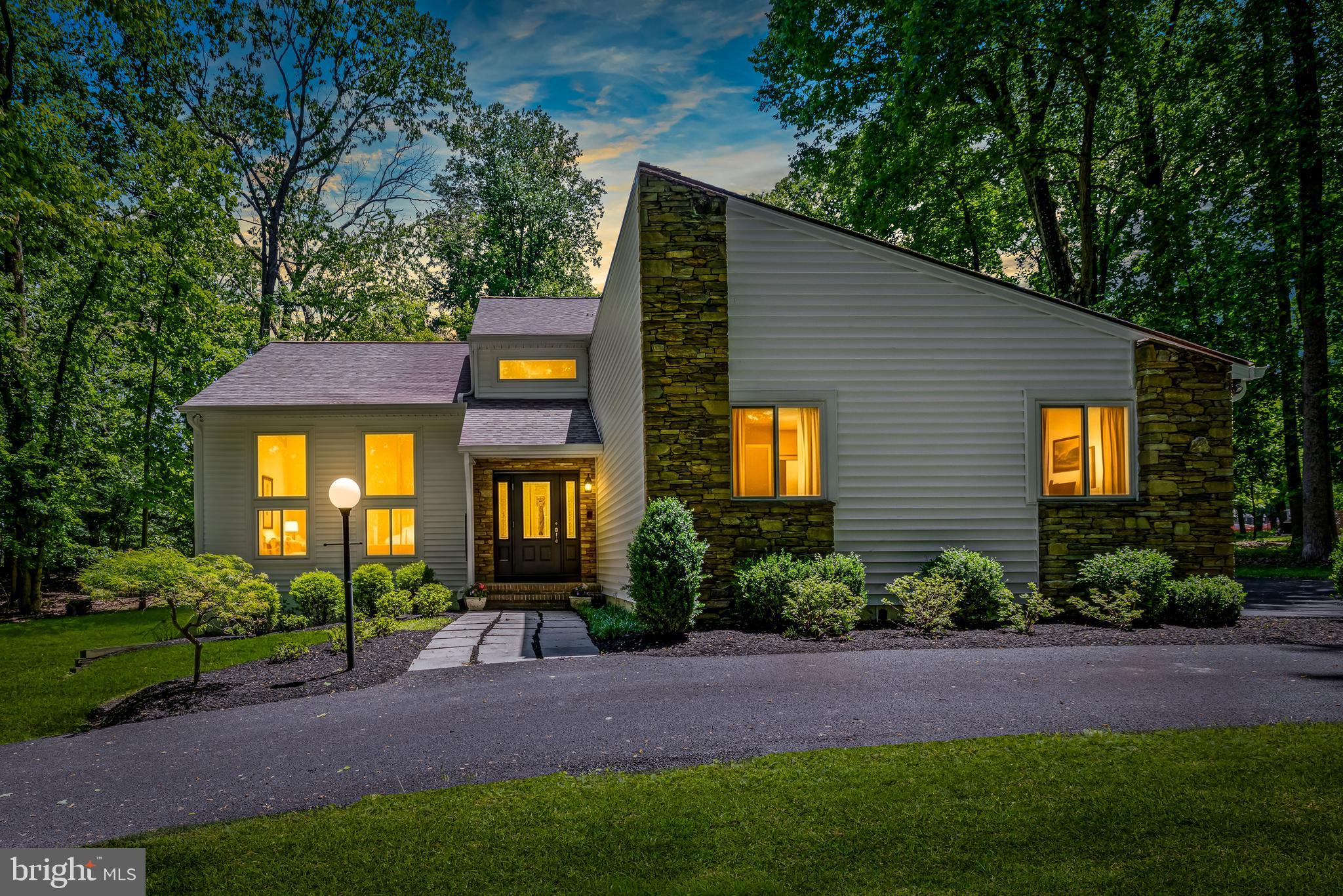 Welcome to 7 Shadow Court, a sanctuary of modern comfort and architectural charm tucked away on a lush, wooded 1.09-acre lot. Located in one of Owings Mills’ most peaceful cul-de-sacs and renovated top to bottom, this home immediately impresses with its vaulted foyer and living room. The residence has been meticulously maintained and thoughtfully updated to offer "big-ticket" peace of mind, starting with a new roof installed in 2020. The heart of the home is the spacious kitchen, with brand new cabinetry, quartz counters and Cafe stainless steel appliances. Enjoy cozy family gatherings or quiet evenings in the family room with its woodburning fireplace. Efficiency and resilience truly set this property apart. The home features a thoughtfully upgraded heat pump system installed just a few years ago for optimal year-round climate control. Most notably, the leased solar panels provide a premier neighborhood advantage; while surrounding homes may lose electricity during storms, this system is designed to keep your power on when the neighbor's power goes out. A Tesla charging station in the garage makes the home EV ready! Combining dramatic interior volume with cutting-edge utility reliability and a private woodland setting, 7 Shadow Court is a rare find that is as functional as it is beautiful.