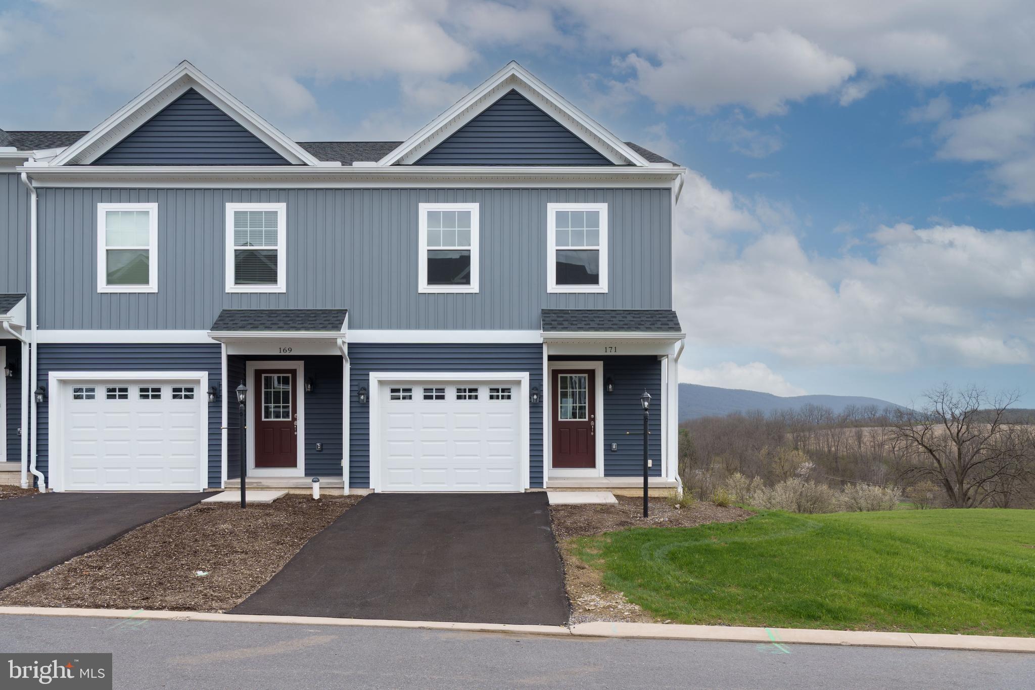Steeplechase offers a suburban setting with walking paths and landscaped common areas, located 5 minutes from I-99, near Historic Bellefonte, and 10–15 minutes from Penn State University. 

The Steadfield end-unit plan features a kitchen with quartz countertops, gray cabinetry, a center island with overhang, and Whirlpool appliances, including a smooth top range, microwave, and dishwasher. Wafer LED lighting is included throughout. A 10' x 10' pressure-treated deck provides outdoor space. The owner’s suite includes a private bath, and second-floor laundry adds convenience. The home also includes an unfinished walk-out basement with a full window on the rear wall, a garage door opener, gas heat, and central air.

Contact us for more details on this home.