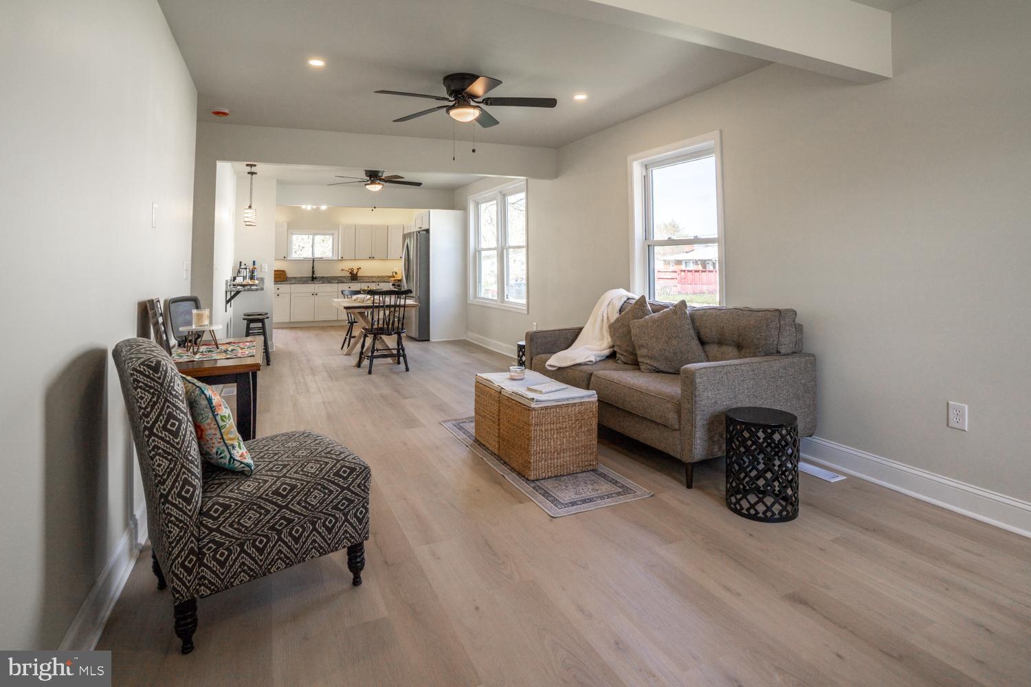 OPEN HOUSE, SATURDAY, 6/6, 11 A.M. TO 1 P.M. -  Welcome Home to this beautifully renovated single-family detached home in Essex at an affordable price! Why rent when you can own for about the same monthly cost!  There are also lots of down-payment assistance options available. Reach out today to find out how you can purchase this home with little to no money down!!

This home has been completely updated from top to bottom, front to back (down to the studs) and offers the perfect blend of modern finishes and comfortable living.  Upon entry in to the home you will be pleasantly pleased with the soaring 8-foot ceilings, open-concept main level with a front to back view through the LR, DR and kitchen.  Two bedrooms, a full bath with laundry tucked away in a closet and your very own coffee bar complete this level.  As you make your way through the main level, take time to note the brand-new LVP flooring, new LED recessed lighting, new trendy light fixtures throughout and MOST OF ALL -- the tranquil, zen-like neutral color palette that welcomes you HOME.  If you’re a coffee lover – you have your very own private coffee bar with trendy lighting, granite wall-mounted counter where you will sit, sip and enjoy your morning coffee (also a charging station for electronics), OR,  you may prefer the outdoors for your a.m. coffee.  In that case, through the kitchen out to your new 10 x 20 back deck that’s also perfect for entertaining, relaxing, or enjoying warm evenings! Back inside, the LR offers ample space for a generous-sized wall-mounted TV and bask in the drenching sunlight that flows through the tall windows throughout this level. The LR flows through to your DR space and into your stunner of a kitchen that features white, soft-close wood cabinetry, granite countertops, new SS fridge and gas stove.  While you are viewing, you have to take a minute to turn on the under-cabinet lighting!! The full bath on this level features a tub/shower combo with ceramic tile surround, trendy finishes, ample shelving and a NEW stackable washer/dryer.  You will also be pleased with the BR sizes on this level.  Bonus - the front BR features a window seat for hours of reading or just people watching! Also, 2 closets in this BR.  Upstairs, you’ll find the 3rd bedroom that offers its own private en-suite featuring a walk-in shower with ceramic tile surround - showcasing stylish neutral finishes.  The basement is gravel and unfinished but houses the utilities (basement space is about 4 feet tall and would not be feasible for living space).  Take your worries away and know that the details have been checked off in this home - (in addition to the above) -- the new AC system (gas heat several years old), updated plumbing, electric, new wood front porch and back deck, new washer and dryer, new architectural shingle roof and gutters, new siding and MORE!!  

Home is conveniently located close to shopping, dining, outdoor activities such as boating, fishing, crabbing, swimming and more, as well as close to major commuter routes including 702 and 695. 

No more searching for "Homes For Sale Near Me."  This is it!  You have found it!  Make this move-in-ready and affordable home in Essex yours today! 

Home is zoned RO (residential office), which means you could also run a business out of this space.  Check with Baltimore County for specifics.