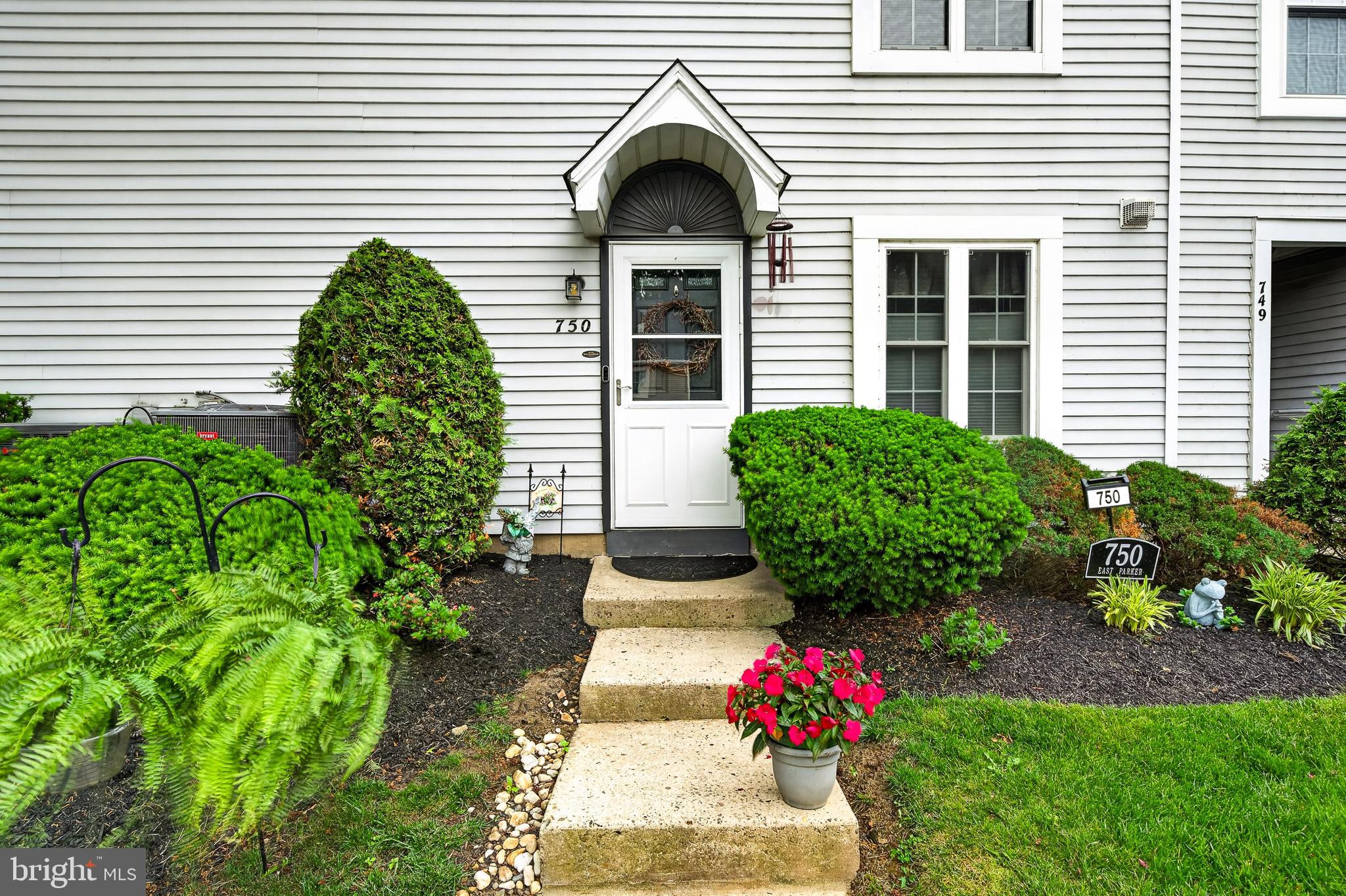Welcome to 750 E. Parker Street, a beautifully updated 2-bedroom, 2-bath condominium in the desirable Commons of Middletown community. This move-in ready home offers the perfect combination of comfort, style, and low-maintenance living.

Step inside to discover gorgeous luxury vinyl plank flooring that flows throughout the home, creating a warm, modern feel and seamless design. The spacious living and dining areas offer an open, inviting layout perfect for everyday living and entertaining alike.

The well-appointed floor plan features two generously sized bedrooms and two full bathrooms, including a private primary suite. Abundant closet space and multiple storage areas provide plenty of room for organization and convenience.

Enjoy your morning coffee or unwind after a long day on the charming patio overlooking beautifully landscaped grounds, offering a peaceful outdoor retreat. Thoughtfully maintained and tastefully updated, this home is truly ready for its next owner to move right in and enjoy.

Ideally located near shopping, dining, major commuter routes, and public transportation, this wonderful condo offers easy living in a highly convenient location. Don't miss your opportunity to own this stylish and well-maintained home in the sought-after Commons of Middletown community.