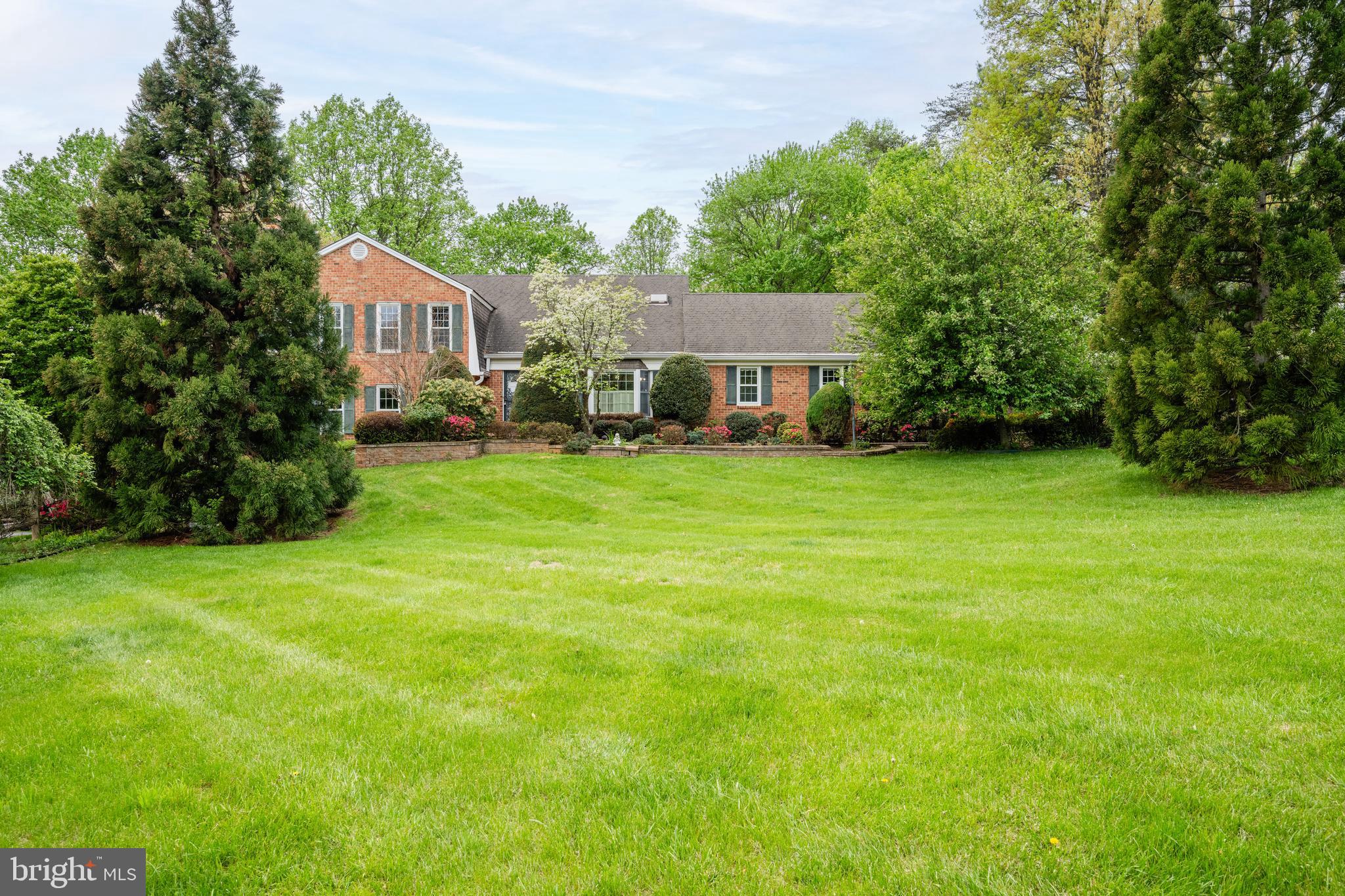 MAJOR PRICE REDUCTION!  **Open House Sat., 5/10 from 12-2 PM** One-of-a-kind stunning property situated on over a 1/2 acre ready for your personal touches!  This home features 3,000 square feet just on the main & upper levels with the ability to add even more space by finishing the walkout basement. Gleaming hardwood flooring throughout foyer, living room, dining room, kitchen, & main level office.  The chef's kitchen includes cherry cabinets, upgraded countertops, pendant lighting, spacious pantry, plus eat-in space with bay window. Right off of the family room is a home office with built-in bookshelves. Wait until you see the enclosed deck with tons of natural light overlooking the wooded backyard!  Upstairs are four spacious bedrooms including an oversized owner's suite featuring a sitting room.  The owner's bath features a walk-in closet, standup shower, large corner soaking tub, & skylight.   The hall bath has been renovated to include ceramic flooring & wall surround, replacement vanity, & updated lighting and faucet fixtures.  The lower level has tons of opportunity should you choose to finish this space or simply leave it as-is for added storage.  Plus there's a walkout exit that leads you to a private, covered patio surrounded by beautiful landscaping.  All in a neighborhood with no HOA fee, right down the road from Wayland Street Park, in the coveted Oakton High School Pyramid with easy access to major commuter routes.  Newly replaced dual-zone HVAC installed in 2023 and 2020.  Schedule your private tour today!