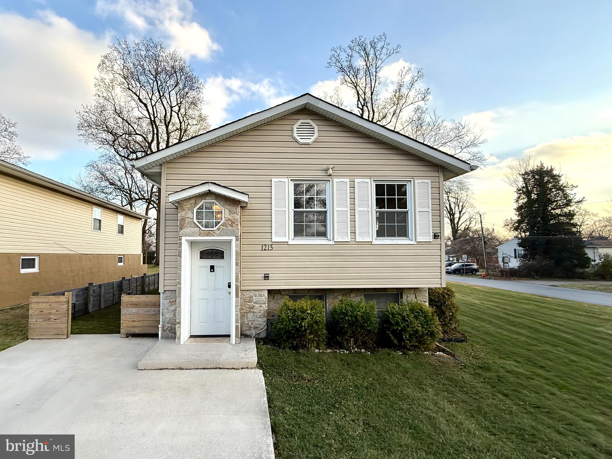 Welcome to this bright and move-in ready 4-bedroom, 2-bath bi-level home on a spacious corner lot in Catonsville Manor. This home features an inviting split-foyer entry with updated flooring, fresh paint, and plenty of natural light throughout. The upper level offers an open living and dining area with large windows and new LVP flooring, along with three generously sized bedrooms and a full bath. The fully finished lower level includes a large rec room, a third bedroom, a second full bath, and a walk-out rear entrance—perfect for guests, a home office, or additional living space.

Enjoy a wide driveway for multiple vehicles, low-maintenance vinyl siding, stone front details, and a large yard ideal for outdoor activities. Conveniently located near shopping, parks, commuter routes, and local schools. A great value and ready for immediate occupancy!