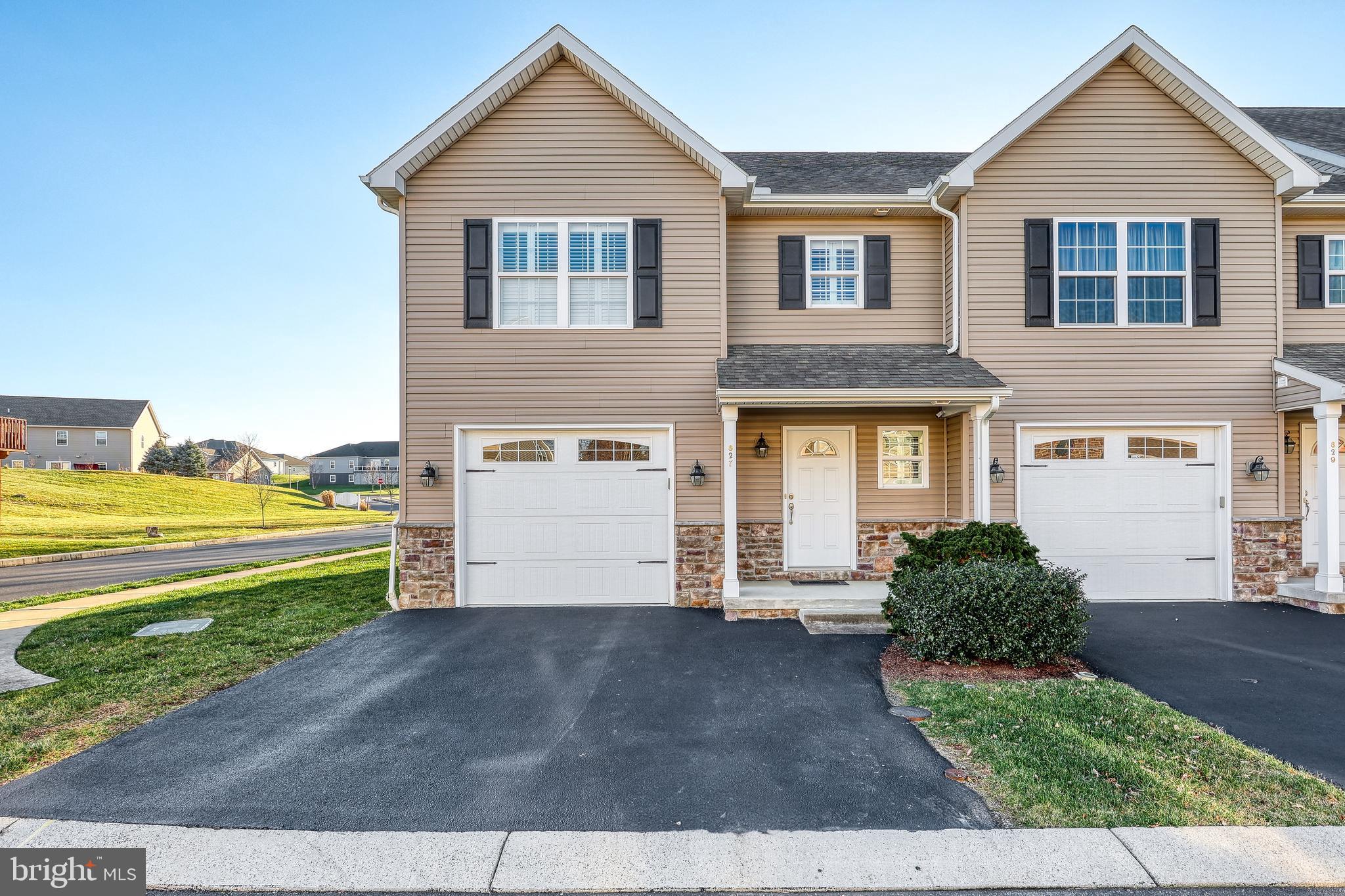 Bright and spacious end unit townhome, meticulously maintained, quality built with upgrades galore. Welcome to Spring Rock Court, a quaint enclave of townhomes perfectly situated on a cul-de-sac setting in award winning Cumberland Valley Schools. Charming exterior with carriage garage doors, covered front porches and stone/vinyl facade. Step inside to gleaming hardwood floors, crown molding, custom plantation shutters and more. Spacious open floor plan features an exceptional kitchen with granite tops, glass tile backsplash, stainless steel appliances, gas stove and pantry closet. Enjoy evenings on your deck with privacy fence overlooking the sprawling rear yard. Owner's bedroom features a tray ceiling, walk-in closet and private bath with double bowl vanity. Two additional spacious bedrooms, a second full bath and a laundry room complete the second floor. Full unfinished basement provides an endless amount of storage and the superior wall foundation makes this easy to finish in the future for additional living space. Energy efficient gas heat. HOA includes lawn care, exterior maintenance and snow removal.  Exceptionally well maintained and move in ready. Refrigerator, washer and dryer included. Call to schedule your own private showing to see it for yourself. This is one you do not want to miss!