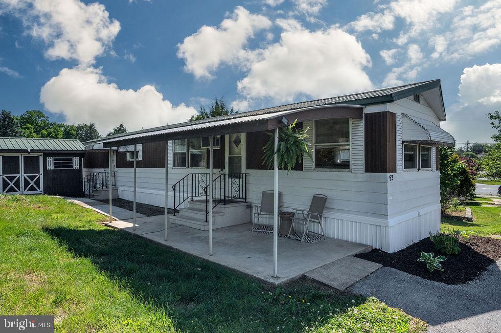 Affordable living at its finest in Exeter Township! Welcome to this charming 2-bedroom, 1-bath mobile home, where pride of ownership shines through. The interior boasts beautiful parquet floors and an abundance of custom built-ins offering fantastic storage space throughout. Enjoy peace of mind with a durable metal roof and a low-maintenance exterior designed for easy living. Step outside to find a large shed equipped with both electricity and air conditioning—the absolute perfect setup for anyone who loves a workshop or needs a dedicated space to tinker! Complete with convenient off-street driveway parking, this budget-friendly gem is ready for its next owner. Why rent when you can own. Schedule your tour today!
