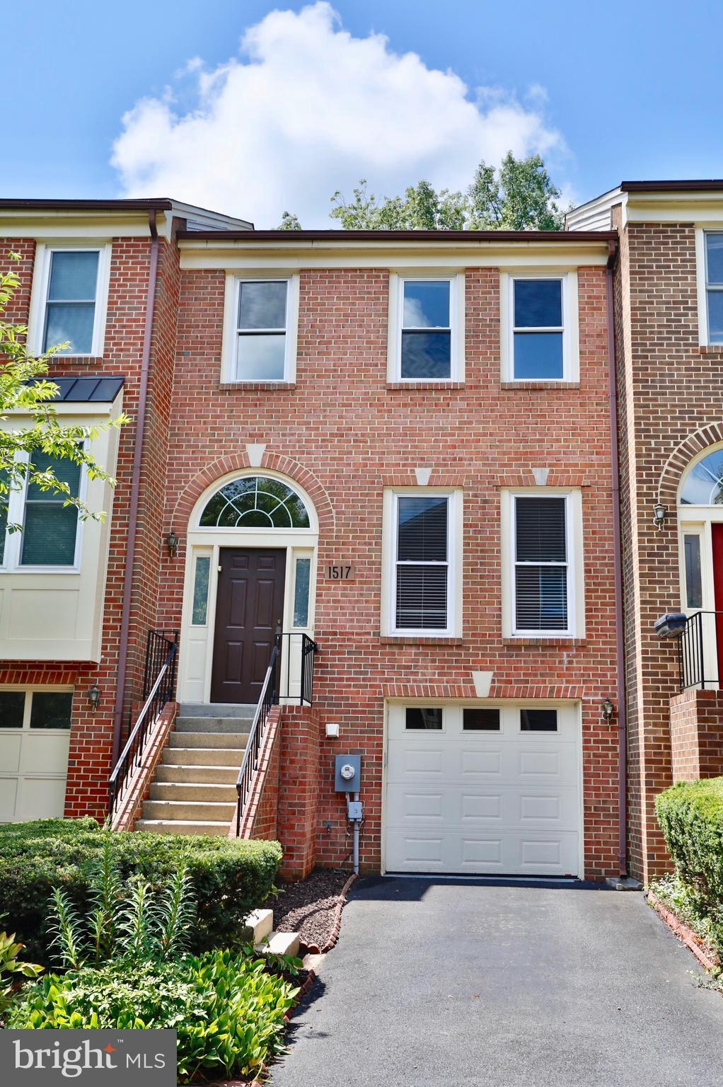 Finally is ready for new occupants!  A captivating 4 lvl brick front garage TH w/everything you could possibly want! 3 BR, 3.5 BA, HW floors on main, cathedral ceilings, fam. room, fireplace, walk out bsm, big kitchen. Move-in ready, reflecting caring owner! Super convenient location, backs to Woodmont Country Club, walk to Metro and shops! Must see to appreciate!