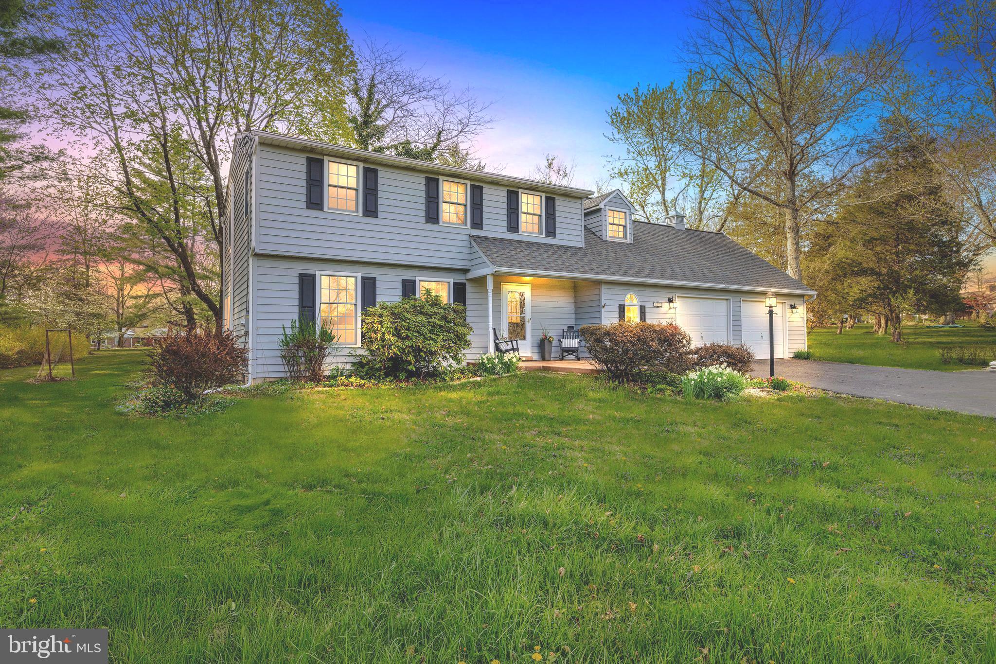 Welcome to 810 Lonely Rd, a beautifully maintained home situated on a full acre of land. This charming and lovely property features a traditional colonial layout with generous living spaces and tasteful updates throughout. Owners entering through the two-car garage directly into the house will love the oversized laundry room--perfect for leaving shoes and coats before heading inside. Guests will appreciate the long driveway, easy parking, and the warm welcome of the front door. Inside, the living room boasts a built-in banquet along the entire wall and opens to a dining room filled with natural light from windows overlooking the yard. The kitchen offers timeless cabinetry, granite countertops, tile flooring, and stainless steel appliances. There is a peninsula which offers even more counter space and a custom-built spot to gather for casual meals or your morning cup of coffee.  Entertaining is effortless with everything this sunny space offers with its expansive family room with a skylight, cozy wood-burning stove, and sliding doors leading to two decks and huge backyard. This level also includes a convenient powder room and access to unfinished basement. Upstairs, the primary bedroom is a true retreat, featuring a dream-come-true walk-in closet and a stunning ensuite bath with double vanities and a doorless walk-in shower accented by tumbled stone tile. Four (yes, four more!) additional bedrooms with closets share a beautifully updated full bathroom, complete with glass tile, double sinks, and a granite countertop. Enjoy the outdoors and privacy in every season in this truly bucolic setting,  ideal for your summer barbecues, game day parties, or simply stargazing around the fire pit no matter what the weather! At 810 Lonely Rd, you’ll feel a world away from the everyday hustle and bustle of daily life, yet remain just minutes from everything you need. Places like this do not come along everyday, and this one truly has it all, so hurry and schedule your tour today!