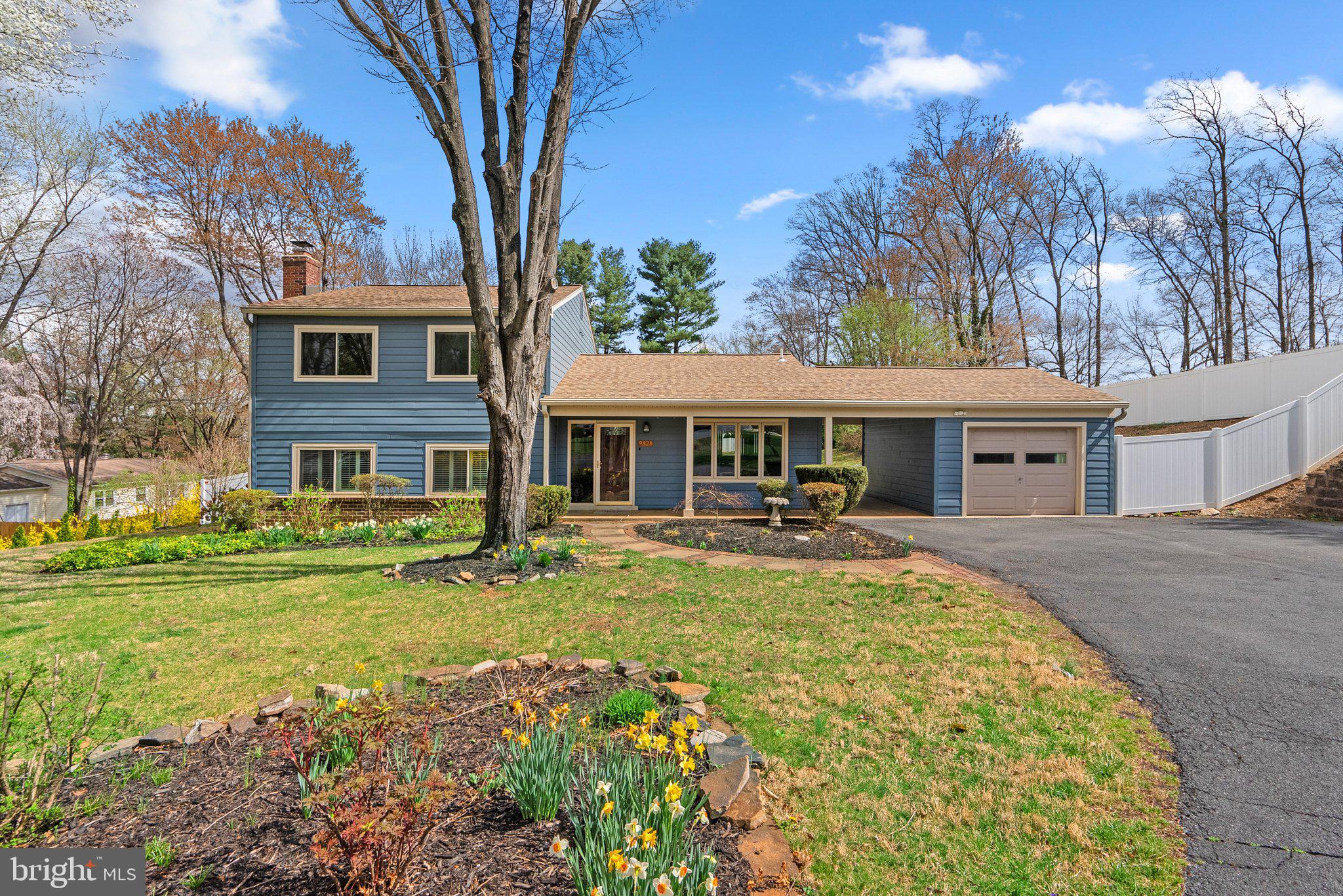 OPEN HOUSE SATURDAY (1-3PM) & SUNDAY (1-3PM)!!! Welcome to this beautifully updated home, blending mid-century modern charm with modern upgrades. Nestled in a serene, friendly neighborhood, this home offers a peaceful, secluded oasis while being close to all the conveniences of everyday life. As you enter, you're greeted by a bright, airy entryway with tall vaulted ceilings that create a sense of openness throughout the main floor. The spacious, open design is perfect for family living and entertaining, with plenty of natural light flooding the rooms. The living room flows effortlessly into the dining area, and the large sliding doors lead to a huge, fenced-in backyard, providing seamless indoor-outdoor living. Beautiful engineered hardwood floors throughout the main floor add warmth and elegance to the space. Step into the heart of this home, where the kitchen will inspire your inner chef! With an abundance of storage, including tall upper cabinets and a spacious pantry, you’ll have all the room you need for kitchen essentials and more. The expansive countertops are perfect for preparing meals, while the bright, airy breakfast nook offers a cozy spot for your morning coffee. Whether you’re cooking for a crowd or enjoying a quiet meal, this kitchen is both functional and fabulous! Head down to the lower level, where you'll find a second living room featuring a stunning exposed brick fireplace wall, creating the ideal atmosphere for cozy nights in or lively gatherings. This level also includes a spacious bedroom and an updated full bathroom, perfect for guests or family members seeking a bit more privacy. A large unfinished storage area with laundry facilities and additional closet space provides plenty of room to organize and store your belongings. Upstairs, the home offers four bedrooms, each with large windows that invite in plenty of natural light. The primary bedroom boasts a walk-in closet and an updated, private full bathroom for your convenience.  A beautiful updated full bathroom in the hallway , and a handy linen closet provide additional storage space. The backyard is your own private paradise, designed for both relaxation and entertainment. Imagine hosting summer BBQs on the spacious patio, surrounded by lush landscaping that creates a tranquil, semi-private oasis. The fenced-in yard ensures privacy, while the storage shed offers a convenient spot for tools or outdoor gear. Whether you’re unwinding after a long day or gathering with friends and family, this expansive yard is the perfect backdrop for memorable moments. Other highlights of this home include updated siding on the exterior, ample closet space throughout, and a great open flow layout that makes for easy living. Whether you're hosting family and friends or enjoying quiet evenings, this home is a perfect fit for a variety of lifestyles. Located in a peaceful and friendly neighborhood, this home is the epitome of comfort, convenience, and style. Come make it yours and enjoy the perfect blend of modern amenities and mid-century charm!