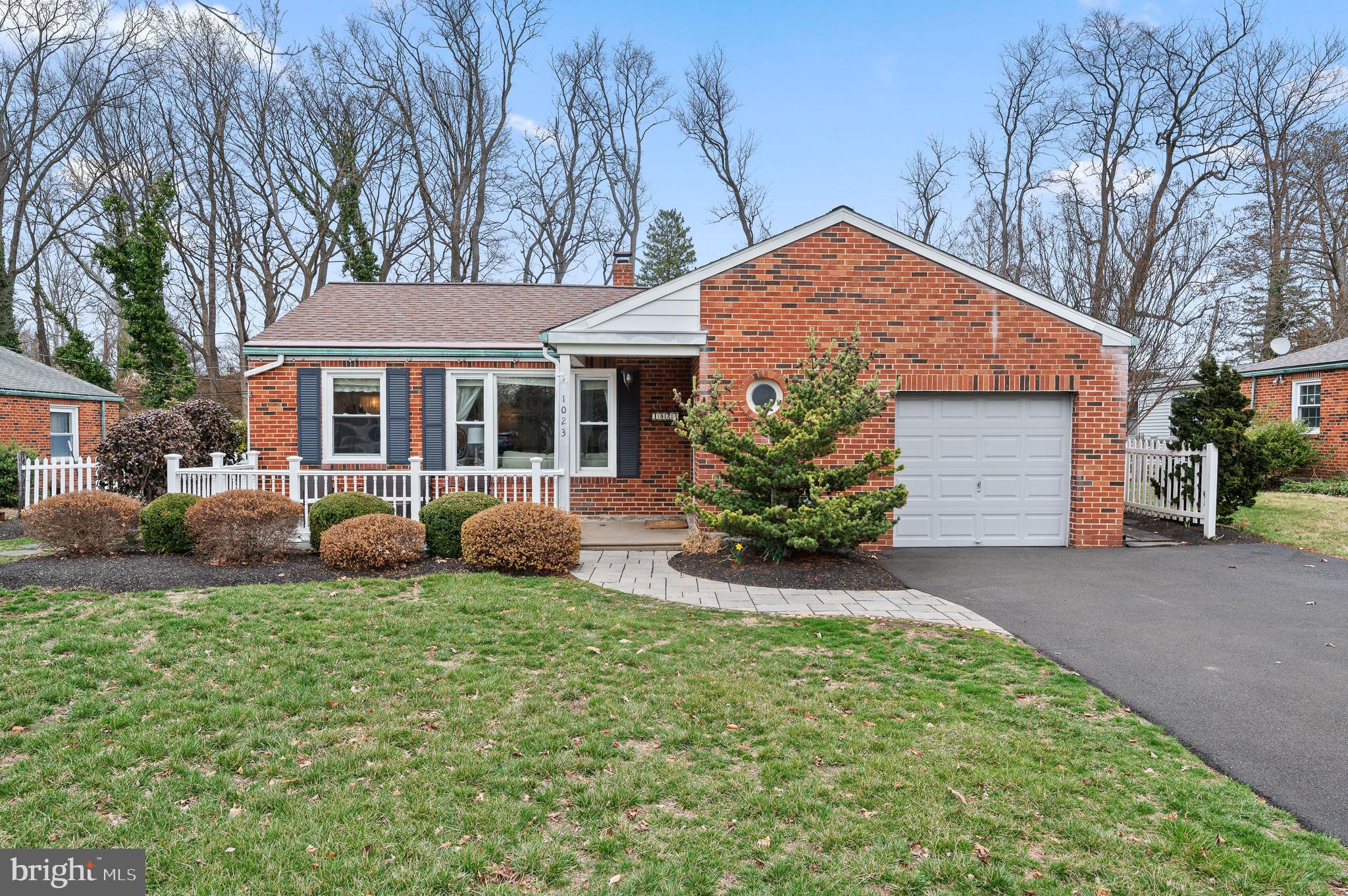 This beautiful 3 Bed / 1.5 Bath Home in like-new condition is located in sought after Northwoods neighborhood and backs up to North Hills Country Club.  1023 Edann is a must see with its newer eat-in Kitchen, updated white tiled Bathrooms, Radiant heated flooring, 1 car garage, private driveway for parking up to 4 or more cars and many other upgrades.

When you step into the Foyer, you are greeted into a sunny and spacious Living Room with white brick fireplace. The Living Room is open to the Dining area which makes it great for entertaining. The Dining Room is also open to the newer Kitchen with ample storage, light gray cabinetry, white quartz countertops and stainless steel appliances. The Kitchen is spacious for a table and chairs for quick meals or utilize a portable island for work space as currently shown.

Off the Kitchen is a Pantry and Laundry Room. Aside from the updates, what sets this home apart from others in the area is that it has a Family Room in the rear of the home with vaulted ceiling, skylights, multiple windows and sliding doors to rear patio and yard. The Family Room is well suited for a large sectional couch and will quickly become the perfect spot for cheering on your favorite team.

The First Bedroom is ample in size and across from bathrooms for convenience. The Primary Bedroom is sizable with multiple closets and room for your King sized bed and dressers. The Third Bedroom is currently used as an office and home gym and its door to Family Room offer possibilities for a nanny or in-law quarters.

There is a newly renovated Half Bath with white and black color palette and a newly retiled tub surround Full Bath and new vanity, toilet and flooring are sure to please any buyer.

Like to entertain outside?  Enjoy morning coffee on the front patio that was installed in 2023  or the enormous completely fenced in backyard that delivers tons of space for play, BBQs and more.  The backyard also backs up to the North Hills Country Club for added privacy. The storage shed is the rear yard also provides storage.

With public utilities, 9 year young roof coupled with other updates, this home check all the boxes a buyer could want in in their next home.

1023 Edann is situated in the Springfield School District and close to all major highways including 309, PA Turnpike and Rte 476. Regional rail opportunities are nearby to commute to Center City Philadelphia or NYC.