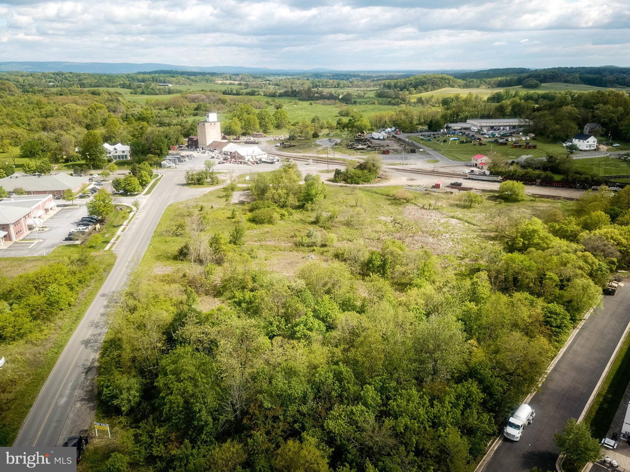 Three parcels totaling 8.69 acres located in Marshall, Virginia. By right uses are multi-family, as well as office and retail uses. The site has excellent frontage on the East side of Old Stockyard Road (Route 1001), as well as having a large amount of frontage on the South side of East Main Street (Route 55). It is approximately 1/4 mile from I-66/U.S. Rt. 17 interchange. The property is located adjacent to Tractor Supply and the Marshall Shopping Center which consists of a Food Lion as well as other small retail shops. The property has seven (7) pre- purchased sewer taps and public water available to the site. Water is currently not available to the site. It is zoned under the Marshall Code in the Gateway District.
