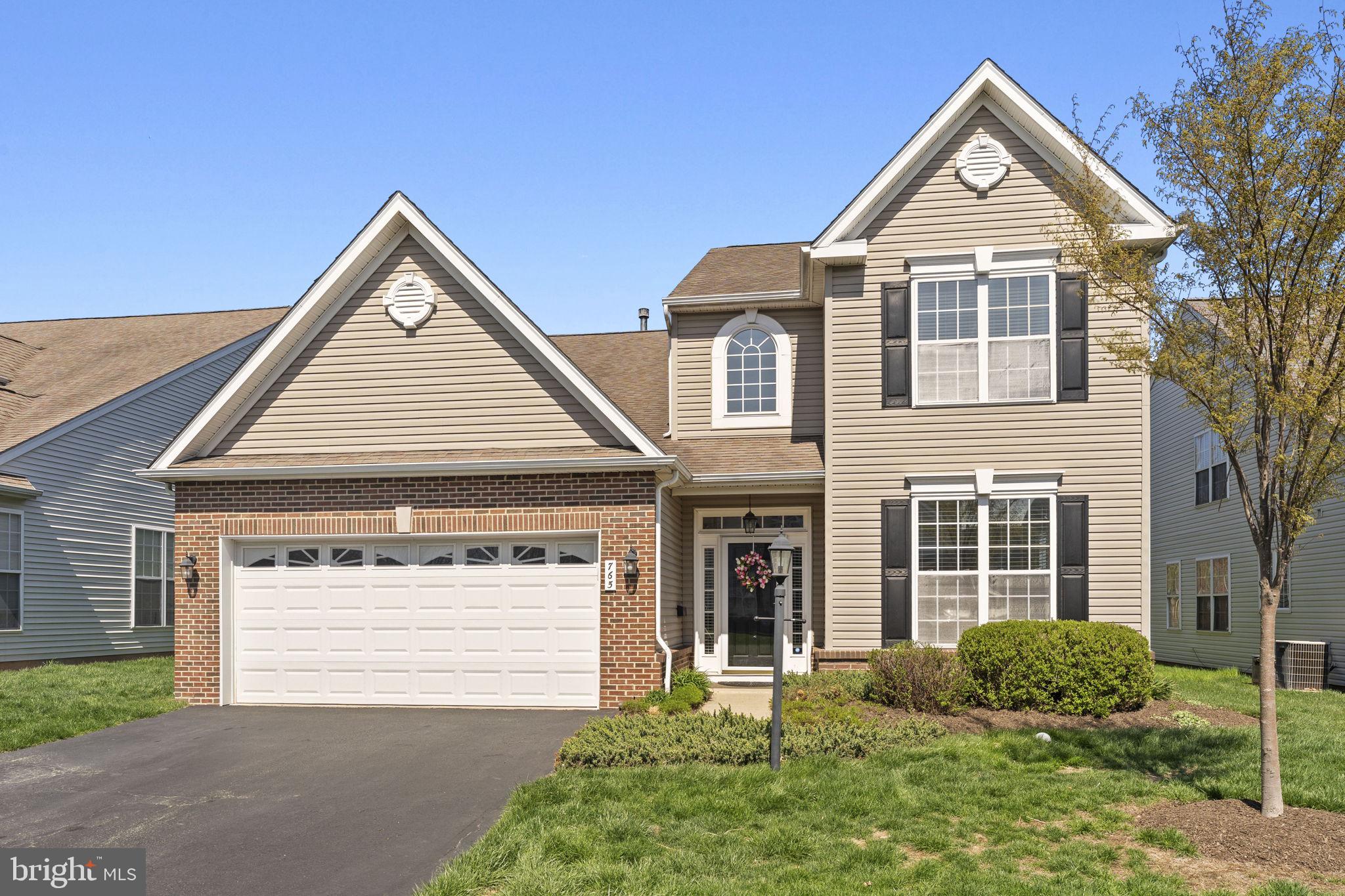 Welcome to the award winning Traditions at Skippack active adult community. Here is your opportunity to   have a meticulously maintained and upgraded  Willowdale model home in this highly desireable community.  This limited edition model includes  three comfortable bedrooms, three full baths home with  bonus sun room and many upgrades, on a private perimeter lot with scenic open field views from the spacious rear TREX deck. Upgrades to this exceptional home include  remodeled kitchen w/granite counters and sink, Travertine marble backsplash, newer stainless steel appliances including new microwave, enlarged breakfast bar w/pendant lighting, tile floor and wine storage cabinet, hardwood in living room and dining room, custom built-in bookcases, two downstairs bathrooms  remodeled with granite and bowl sinks,  neutral color carpet upstairs. More recent upgrades include, 11 premium replacement windows, new HVAC system (2019), tankless water heater, large Trex deck (18x10), slider to deck, new Heat n Glo gas fireplace, carpets and paint in downstairs bedrooms, and  a water softener system. Along with the  spacious two-car garage, this home has extensive  storage, with two walk-in closets in the master, along with walk-ins in the other two bedrooms, a pantry and  an under-stair pantry closet,  loft area storage rooms sized 19x15 and 6x12. The first floor includes a convenient expansive  primary suite with cathedral ceiling, and bath with soaking tub and glass framed shower. Community amenities include tennis court (w/pickleball), bocce courts, heated pool, clubhouse with gym, meeting area, kitchen, billiards room and library. Near this exceptional community there is the Provincetown Center with shopping, dining and entertainment and access to the route 422 highway providing convenient access to the King of Prussia Mall complex and other regional highway systems.  This very special home will not last long.