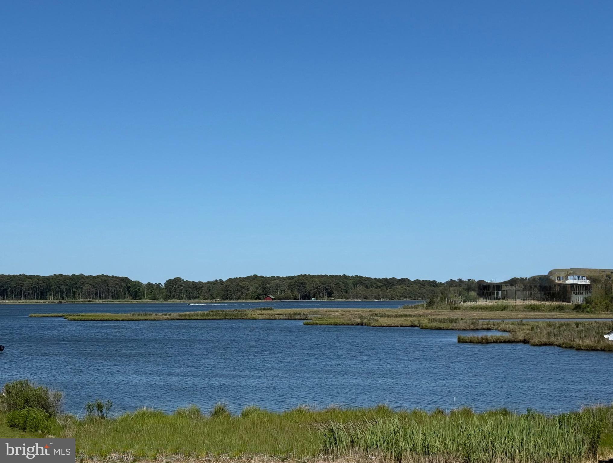 FULL TURN KEY AVAILABLE!! 
WITH A VIEW
Fully Reconstructed and elevated (2017) on a Premium Lot: This Coastal retreat, featuring breathtaking views of the Bay and State Park, is also a true Boater’s Paradise on a canal. Designed for those who demand high-end sophistication and a low-maintenance lifestyle. There is really nothing more that needs to be done to this house but ENJOY!

THE RESIDENCE
• Pristine Living: The second floor offers a king en-suite making it 3 bedrooms and 2 baths on this level. A spacious Kitchen: with high-end finishes,  massive quartz island, dual sinks, and ample space for hosting large gatherings. Separate dining area overlooking the canal. (Freshly painted-new windows 2025)
•  Ease of living: The first floor offers luxury flex-zone including morning bar with a Family/Guest King Suite and separate room for the kids with a 1/2 bath. Professionally decorated with a nautical theme (2023 updated). This 600 + sq. ft. of FEMA-compliant, wet-floodproofed enclosure is finished with moisture-sealed plaster and Poly-walls, with all lower-level electrical/mechanicals elevated to 4’+. 

THE WATERFRONT LIFESTYLE
• Boater’s Dream: Located directly on the canal with a private bulkhead along with a boat launch at the end of the  canal for ultimate convenience. 
• The Ultimate Outdoor Living: 1,500+ sq. ft. Of first and second floor wrap around composite decking for a maintenance free lifestyle. The decking alone would be over 100k. 
• If that is not enough to handle variable day time sun & temperatures there’s additional shaded gathering places & screened-in porch for cooler relaxation. There is also a convenient outdoor shower.
SMART TECH & ENGINEERING
• Superior Climate Control: State-of-the-art Lennox HVAC system with dedicated smartphone app integration.
• Flood-Ready Engineering: Main A/C unit elevated to 8’ 2”; Heat Pump and electrical elevated to 4’+ for maximum protection and preferred insurance rates
• Storage: 575+ sq. ft. garage for vehicles and water toys.
RESORT AMENITIES (Low Association Fees )
• 4 dedicated Pickleball courts, resort-style pool, and children's splash pad, playground, volleyball, tetherball along with a terrific miniature golf area for entire family fun! Swann Keys has fabulous activities like the 4th of July Boat Parade, kids activities with prizes and awesome food. Also the yearly Corn hole Contest which is a premier event to mention a few. Swann Keys offers fabulous family fun at the shore… unbelievably low association fees includes water and trash. 
NEGOTIABLE ADD-ONS (Available via separate Bill of Sale):
• Turnkey Experience: High-end coastal Polywood outdoor furniture and indoor furniture and decor. Kayaks and paddle boards.  $25,000
• The Vessel: 2014 Aqua Patio Tritoon (150hp Yamaha) maintained in the winter with indoor storage $30,000

This REALLY is a move in ready house that everything has been thoughtfully updated with nothing more to do…now all you have to do, if you choose,  is turn the key and live the coastal life.  Reach out today for your appointment.