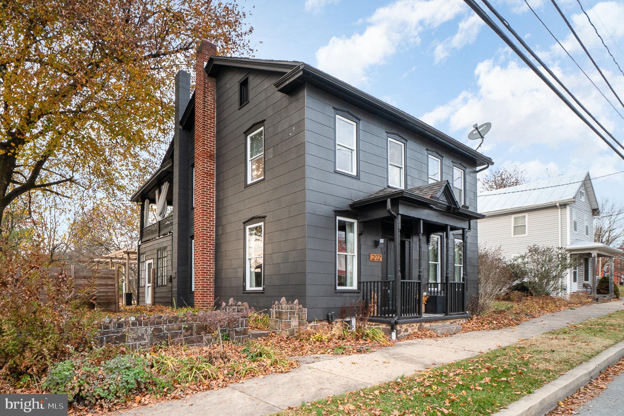 This beautiful home combines character & traditional features with an open and airy vibe.   Main floor is great for entertaining with multiple conversation spaces including spacious living room with wood slat ceiling, exposed beam with concrete finish & study with hardwood floors & built ins.  Gourmet eat-in kitchen features stunning counter to ceiling glass backsplash, floating shelves, concrete style counters & eating bar, double composite sink, dishwasher, stainless refrigerator, dining table space & huge pantry.  Mud room off kitchen offers extra cabinets and potential.  Main floor laundry room & full bath with pedestal sink & tub/shower. Upper level boasts hardwood floors, generous primary bedroom with enormous walk-in closet, dressing island, california closet storage and it's own private covered balcony!  Two additional bedrooms with hardwood floors, closets,  built in shelving, full bath with tub/shower enclosure & storage.  Walk-up attic for additional storage.  If that's not enough, you will fall in love with the fully fenced, private, backyard oasis which showcases an impressive "she/he shed" with covered patio bar area, built in seating and large indoor gathering space!  Additional concrete patio with pergola & built in planters, galvanized steel dipping pool and river stone accents.  Large garage with loft on rear of property is accessed from the alley.  Whether you are hosting a dinner, enjoying morning coffee on the patio or planning your spring gardens...no matter how you look at it...THIS IS HOME!! Some rooms have been virtually staged.
