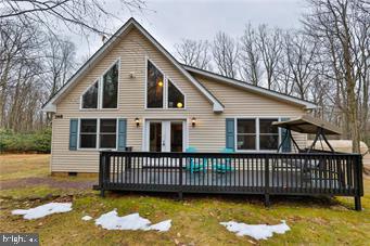 Well maintained Chalet in Penn Forest Township within Pleasant Valley West! This home is being sold with the adjoining lot for a total of 2.12 acres! Quiet and Serene! Enjoy the frequent visits of wildlife and all the amenities you have close by! Clubhouse, playground & recreation area! Plenty of parking for several cars! Inside you will find the two story foyer and family room with a cozy gas fireplace! Open concept kitchen with natural cabinetry, black appliances, modern counters and eat at peninsula! Large dining room with an abundance of windows allows you to take in all the nature you are surrounded by! Glass slider leads you to the private yard! Convenient laundry area on the first floor! One floor living if needed! Two nice sized bedrooms complete with plenty of closet space! Full bath with tub & shower! Second floor loft area opens up into the primary suite with another full bathroom and high ceilings with exposed beams! Build another home on the vacant adjoining lot or keep it for extra privacy and recreation!