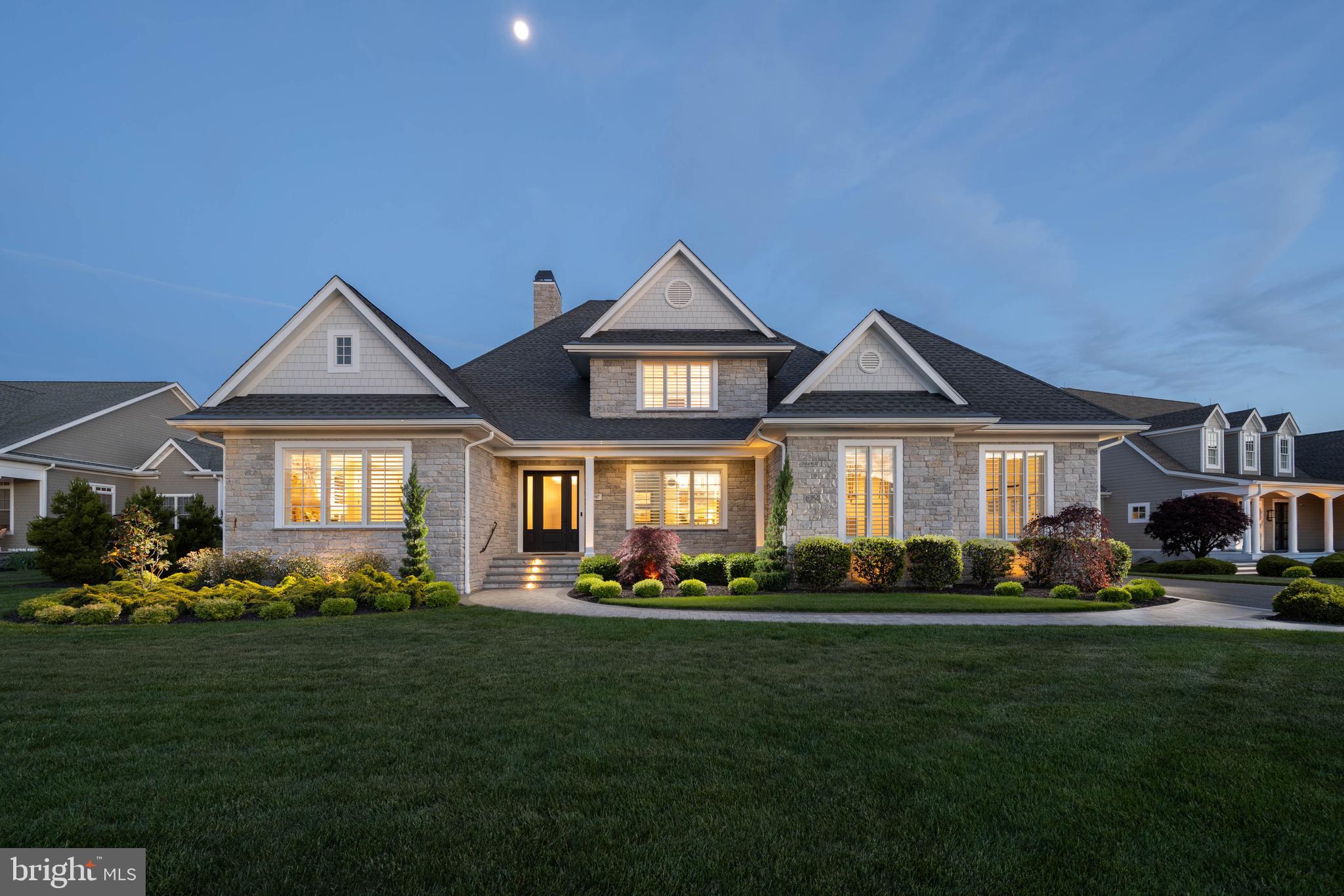 EXPERIENCE THE EPITOME OF LUXURY LIVING IN SHOWFIELD…Step into a realm of sophistication and elegance that rivals the pages of Architectural Digest. Indulge your family & friends with a spacious seamless entertainment flow from room to room with the perfect mix of coastal modern design - accented with gorgeous white oak hardwood flooring throughout entire home. This home features a beautiful and spacious open floor plan with an abundance of features and upgrades (see attached list). The gourmet kitchen is a chef's dream with Wolf and Subzero appliances, walk-in pantry, quartz countertops, & breakfast bar and center island, that overlooks the great room & dining room. Other features include a large first floor owner’s suite with two spacious walk-in closets & luxe en-suite bath, an additional first floor bedroom with private bath, and home office that makes working from home a breeze. Additional highlights and extras include second floor sitting area with wet bar, 2 additional second floor bedrooms each with a full bath, plenty of storage in the walk-in attic and oversized 3 car garage, and so much more that must be seen in person to truly appreciate. Situated on a beautifully landscaped lot with a paver patio, fully fenced yard, and backs to community open space. Enjoy the exceptionally designed community features, a resort-style pool, clubhouse, and trails, while preserving and repurposing the original historic barn on site. Call today to schedule a private showing!