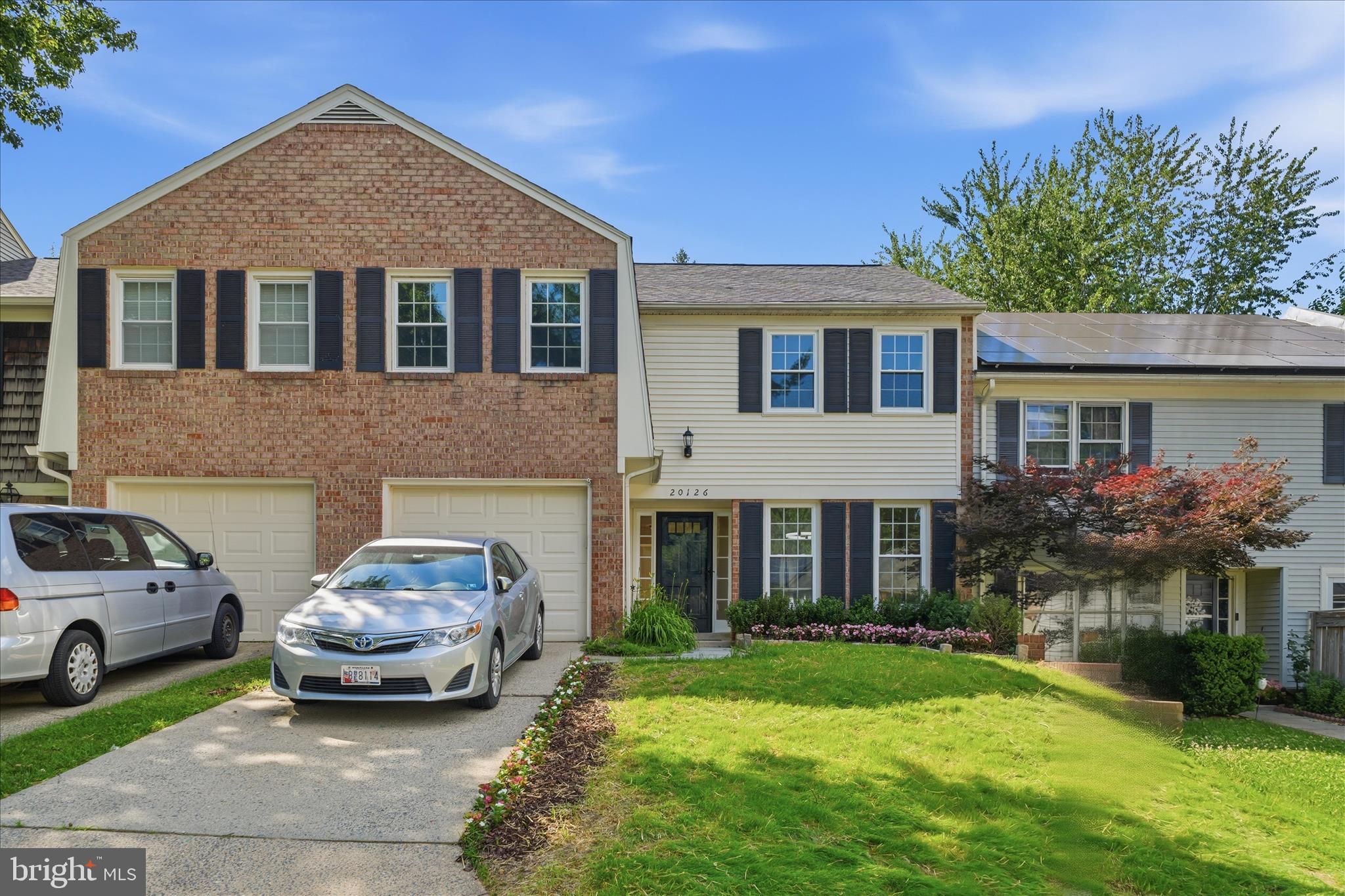 Welcome to 20126 Waringwood Way, Montgomery Village, MD—a beautifully updated and upgraded 4-bedroom, 2.5-bath townhome offering space, style, and convenience. This spacious home features a one-car garage, private driveway, and a fully fenced rear yard.

The stunning renovated kitchen is the heart of the home, boasting brand-new stainless steel appliances including a refrigerator, dishwasher, and stove, along with brand-new 42" white cabinetry, elegant porcelain countertops, ceramic tile flooring, a breakfast area, tray ceiling, decorator ceiling fan with light, and nine recessed lights.

The main level offers a spacious living and dining area with gleaming hardwood floors, creating an inviting space for everyday living and entertaining. A beautifully updated powder room features decorative ceramic tile flooring, wainscoting, cherry vanity, overhead lighting, and two recessed lights.

Upstairs, you'll find four generously sized bedrooms with brand-new carpeting throughout. The hall bath features a tub/shower with tile surround, new white vanity, and porcelain tile flooring. The primary bath has been updated with porcelain tile flooring, a ceramic tile shower surround, vanity, and new mirror and lighting.

Additional highlights include brand-new windows throughout, fresh paint throughout the entire interior, and a finished lower-level recreation room perfect for relaxing, working, or entertaining. The lower level also includes a separate utility/laundry room.

Move-in ready and loaded with upgrades, this exceptional home offers the perfect combination of comfort, style, and value.